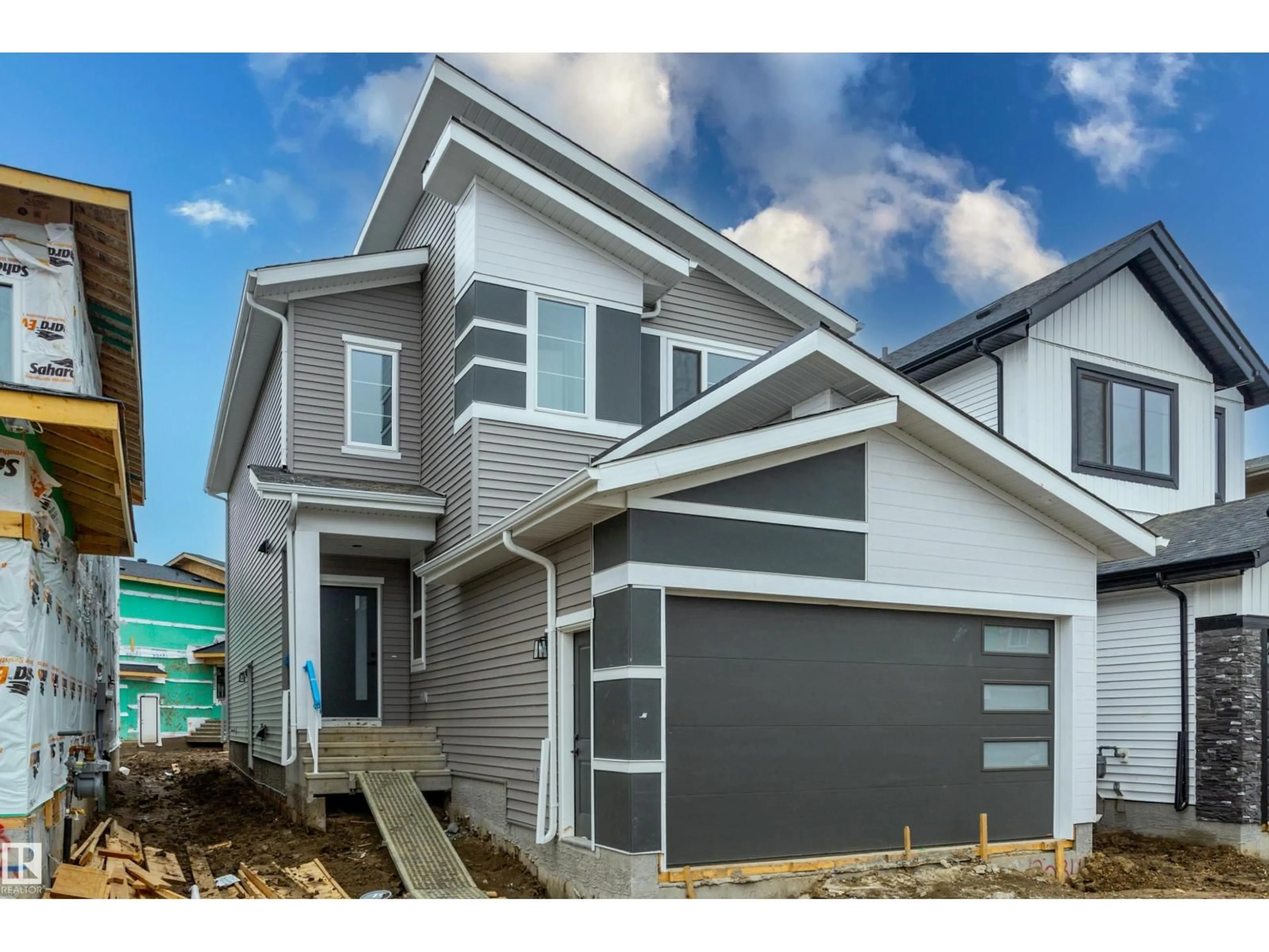 Home with vinyl exterior material, street for SW - 3034 7A AV, Edmonton Alberta T6X3M3