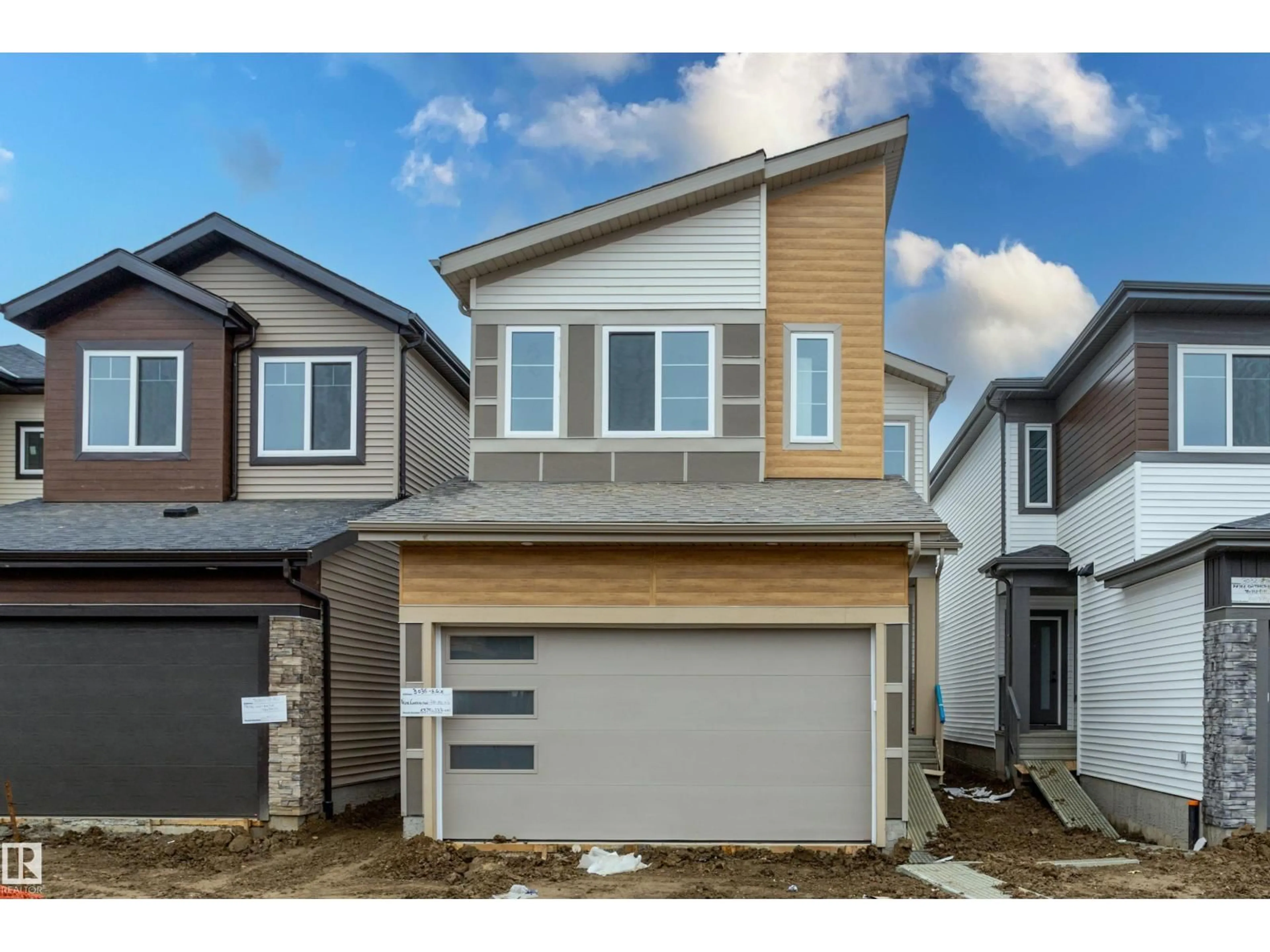 Home with vinyl exterior material, street for 3036 8 AV, Edmonton Alberta T6X3M6