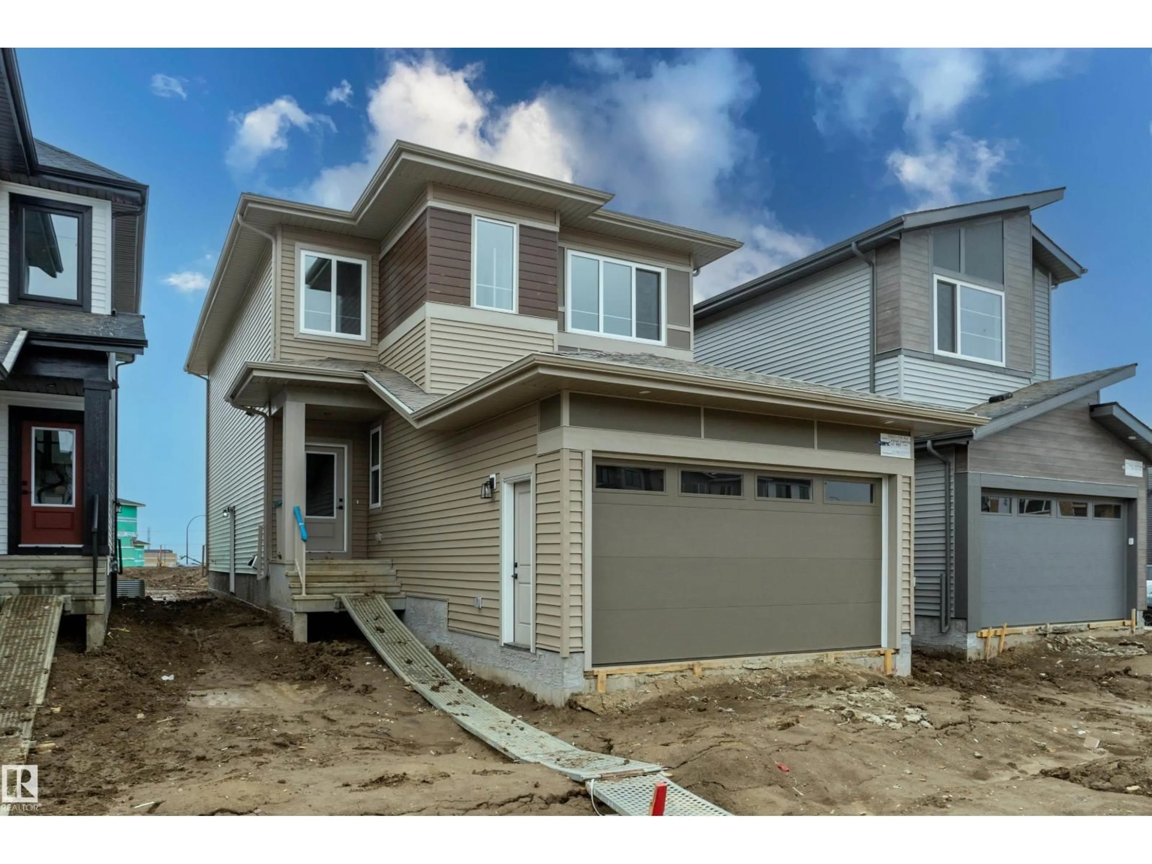 Home with vinyl exterior material, street for 3026 7A AV, Edmonton Alberta T6X3M3