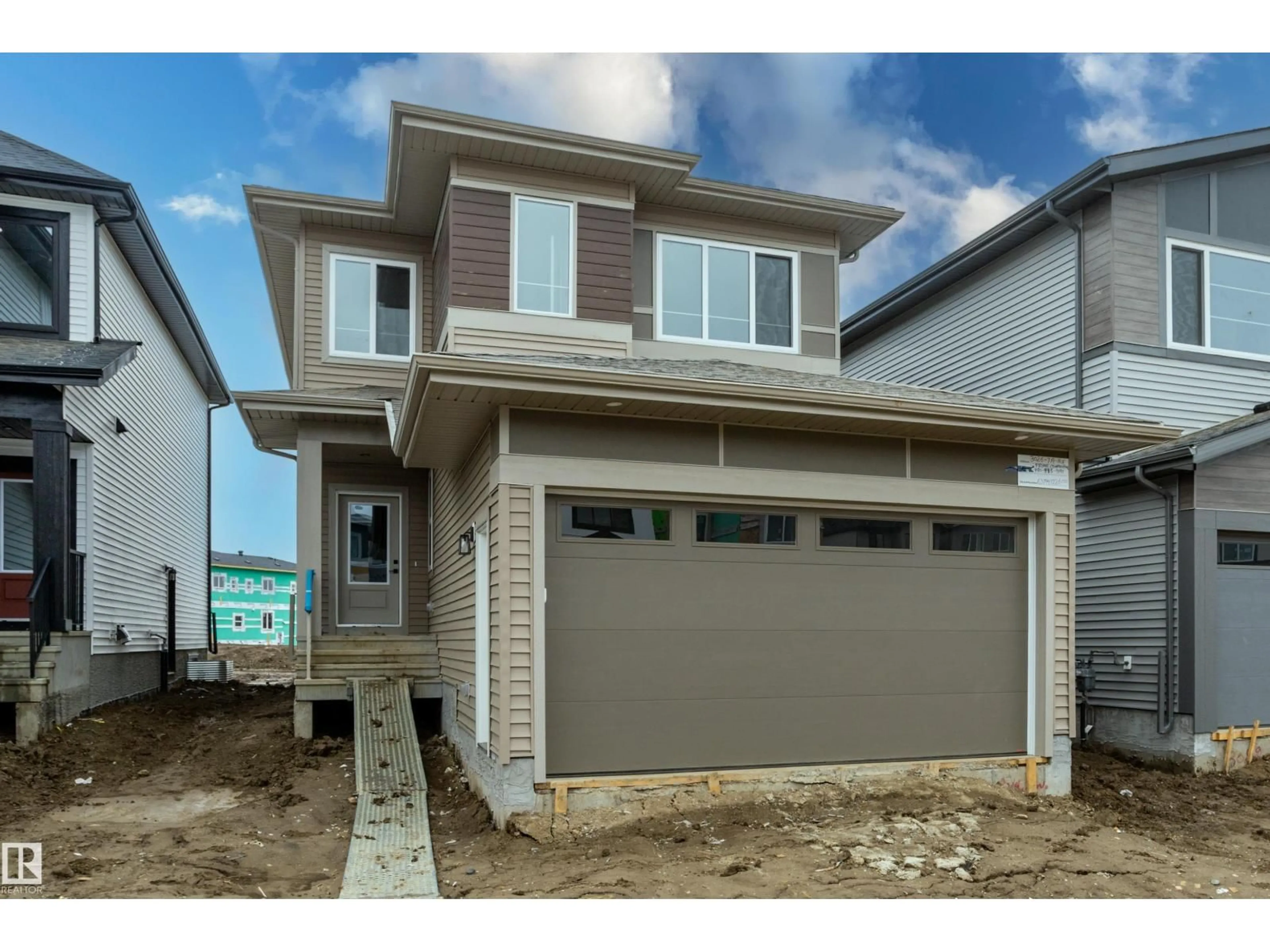 Home with vinyl exterior material, street for 3026 7A AV, Edmonton Alberta T6X3M3