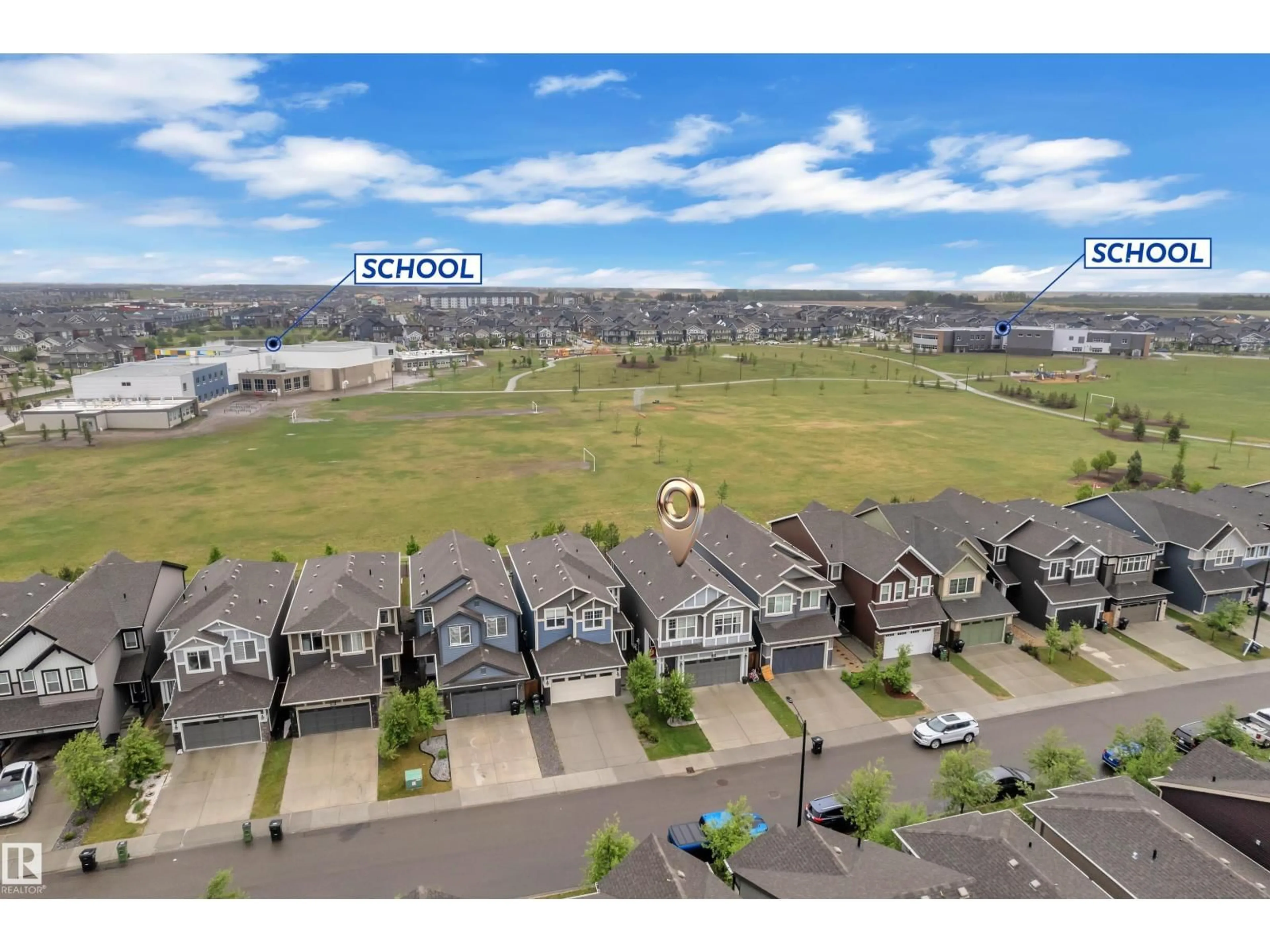 A pic from outside/outdoor area/front of a property/back of a property/a pic from drone, mountain view for SW - 2925 CHOKECHERRY CM, Edmonton Alberta T6X2M3