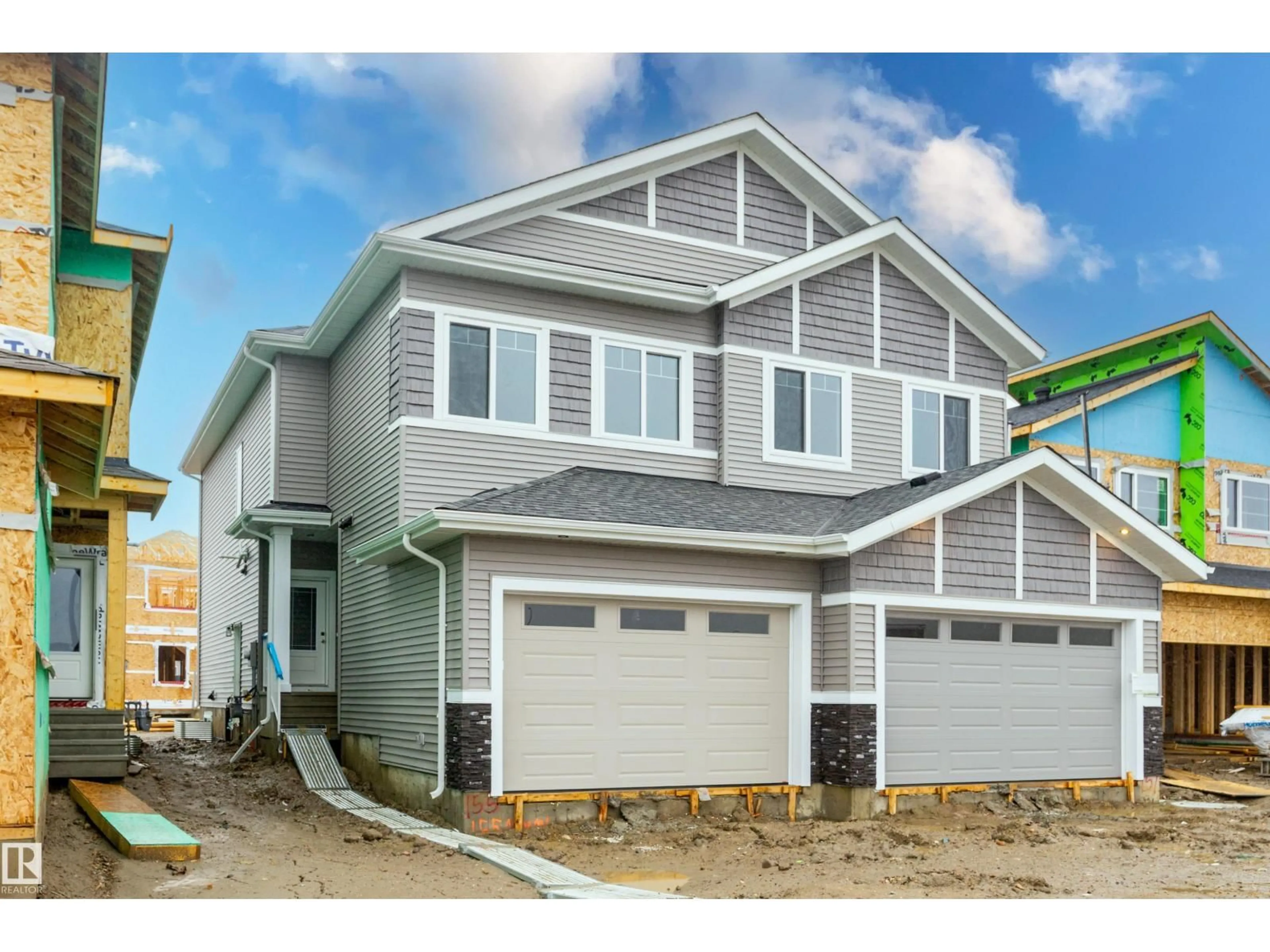 Home with vinyl exterior material, street for 155 MUNN WY, Leduc Alberta T9E1X9