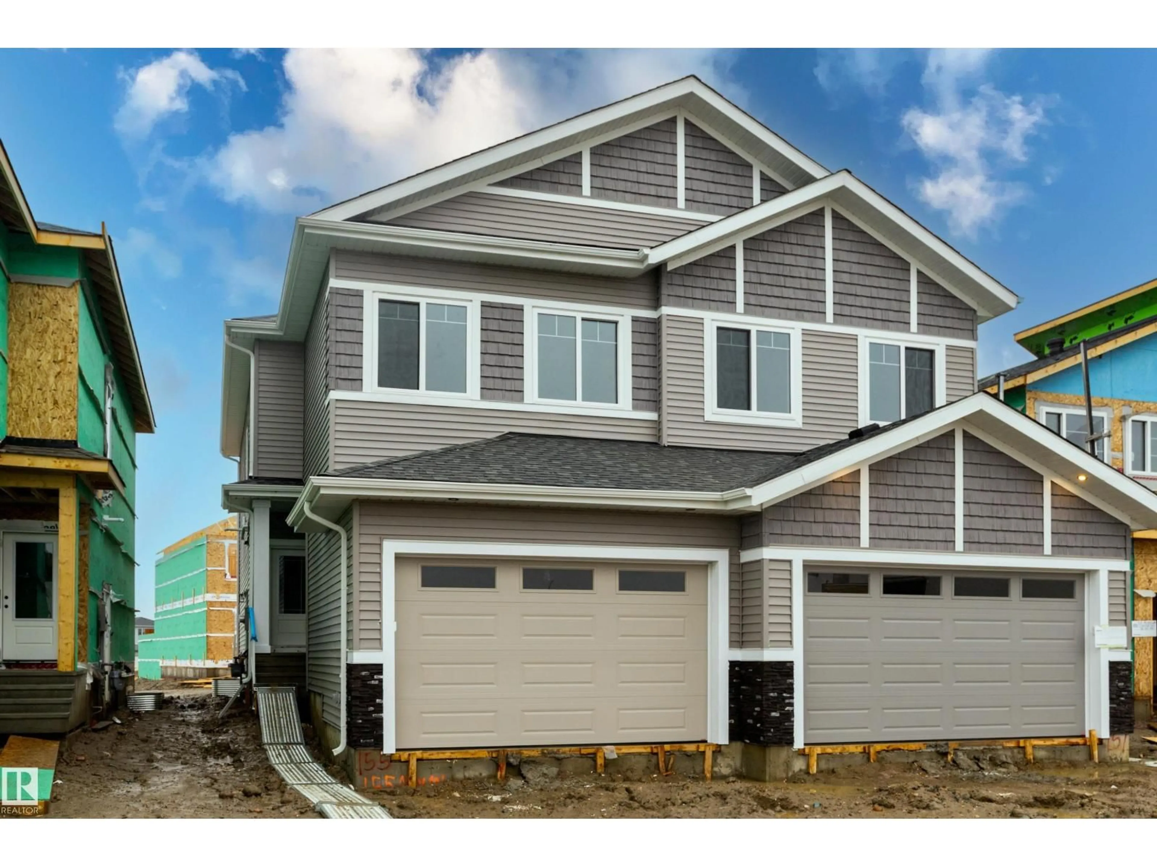 Home with vinyl exterior material, street for 155 MUNN WY, Leduc Alberta T9E1X9