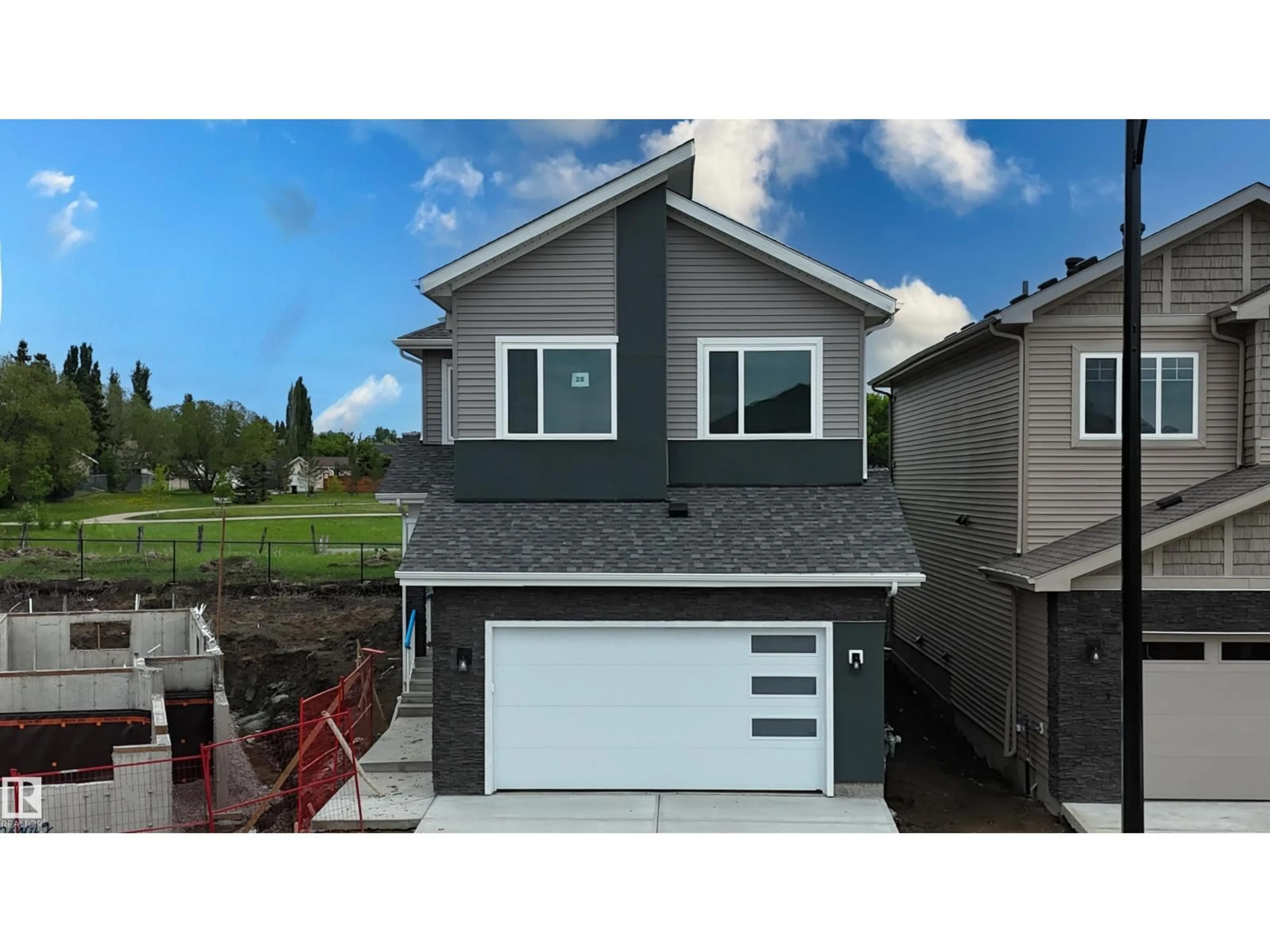 Home with vinyl exterior material, street for 28 MEADOWGROVE LD, Spruce Grove Alberta T7X0W2