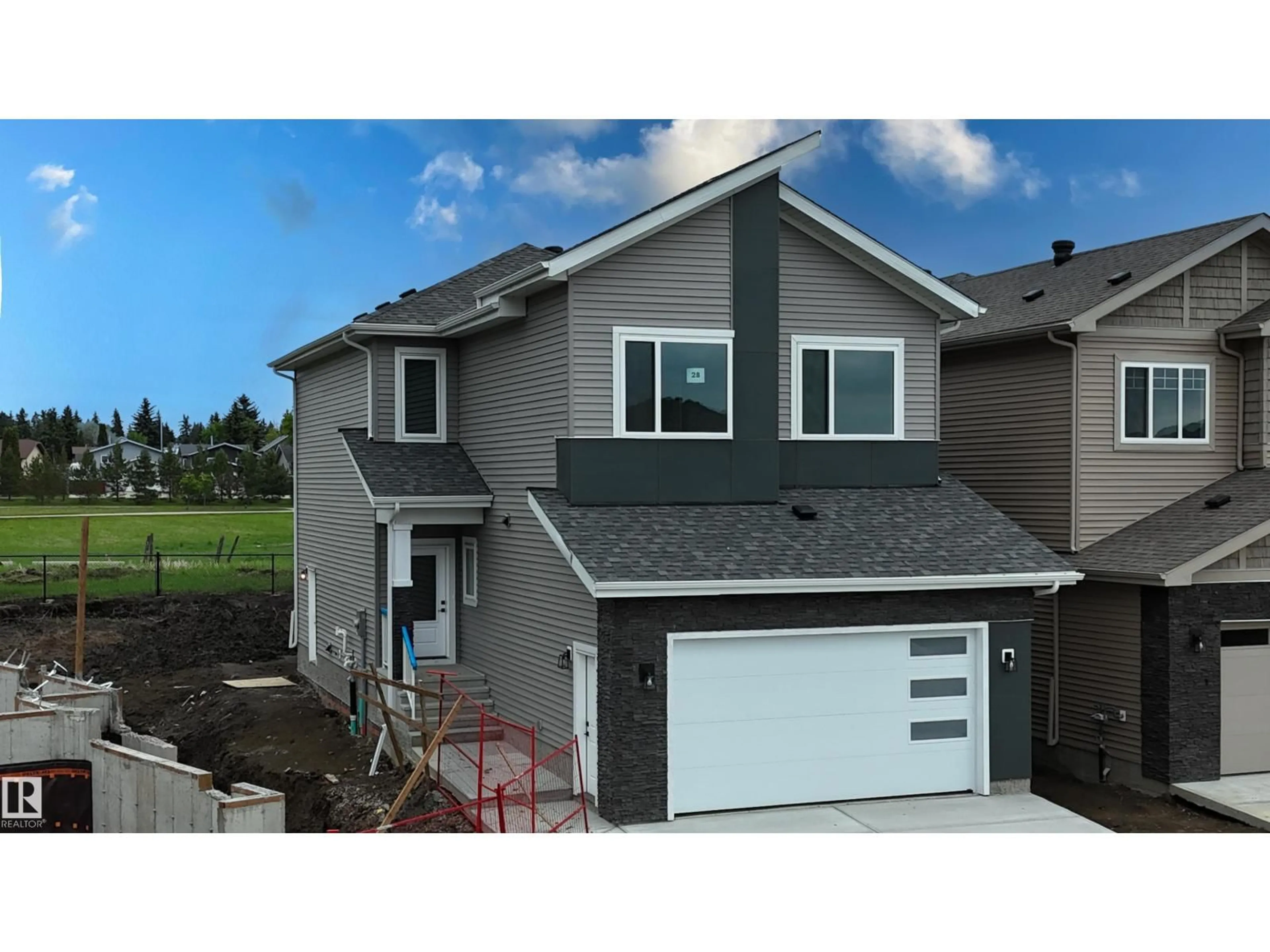 Home with vinyl exterior material, street for 28 MEADOWGROVE LD, Spruce Grove Alberta T7X0W2