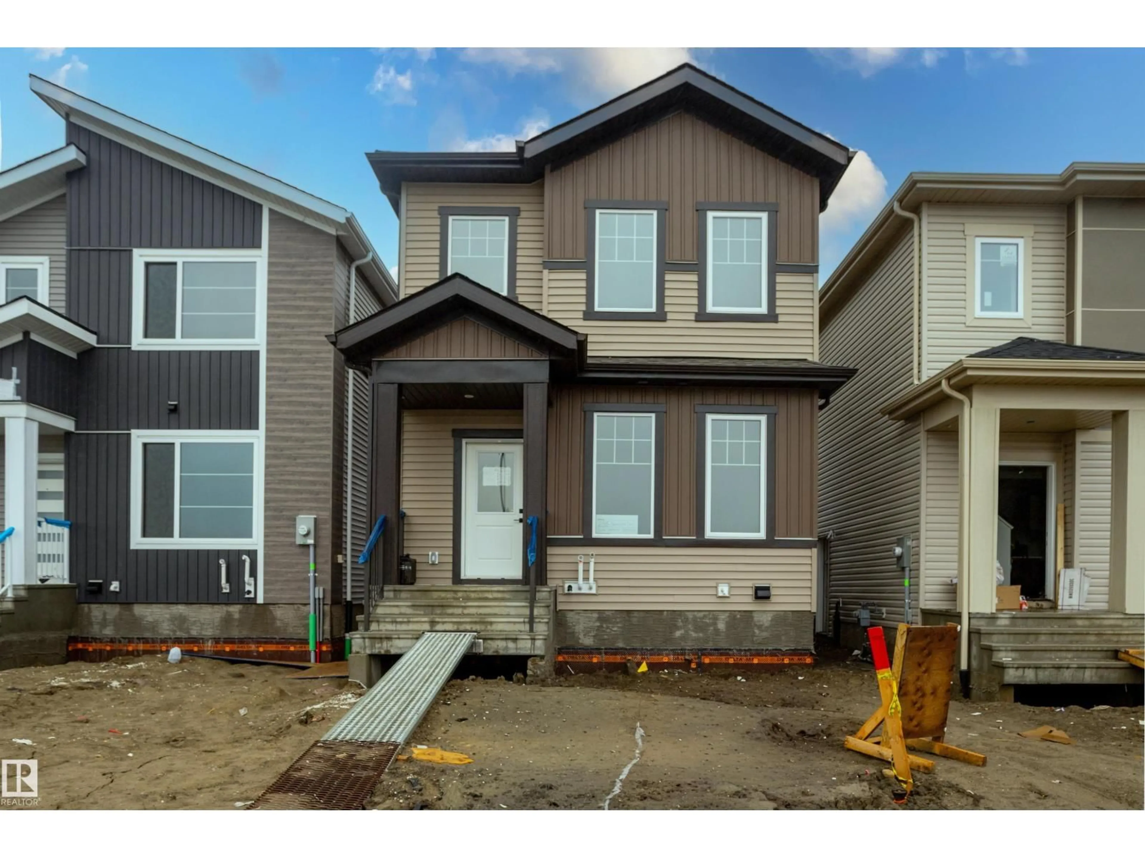 Home with vinyl exterior material, street for 256 BLACK STONE DR, Leduc Alberta T9E1G2