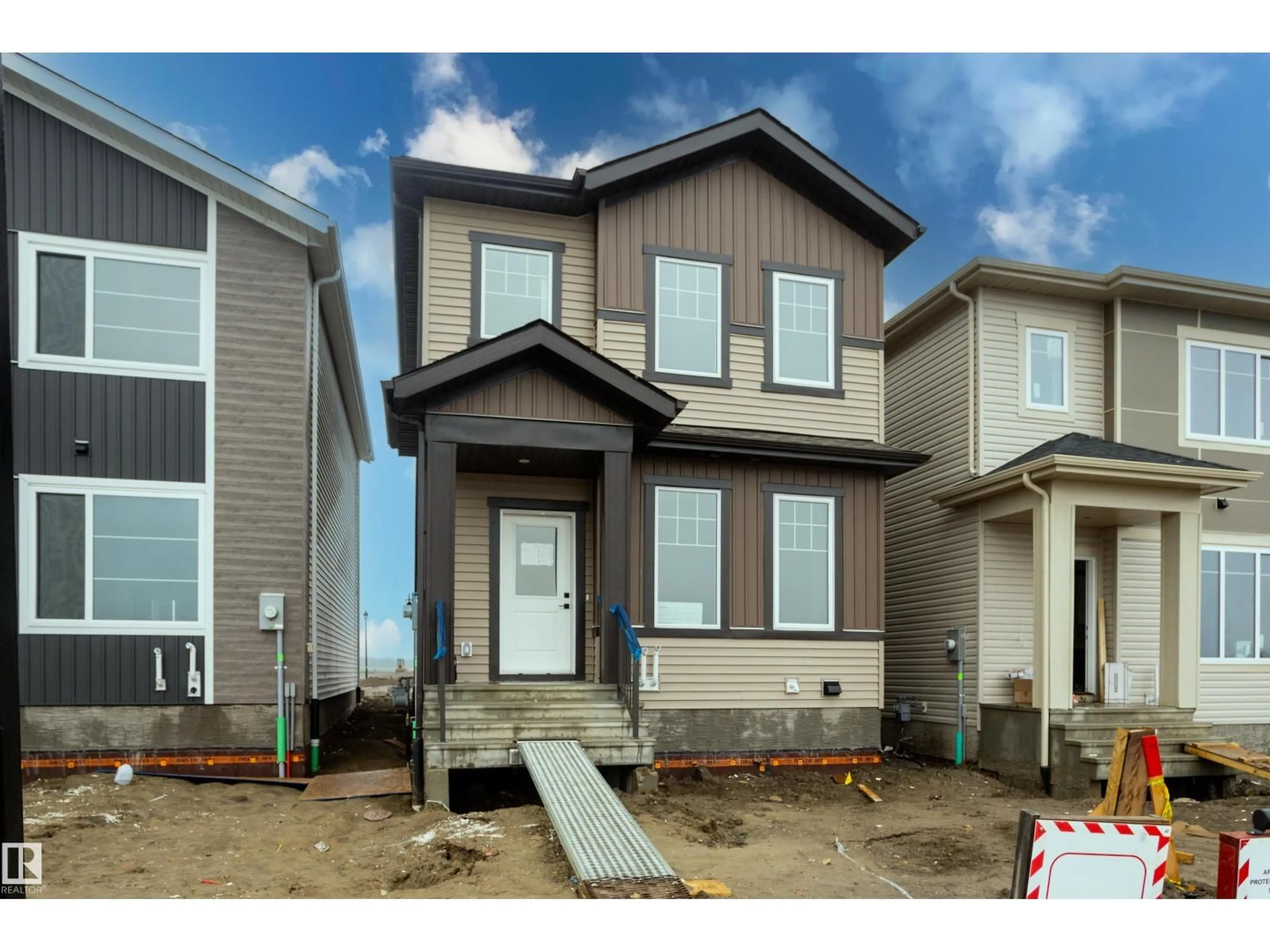 Home with vinyl exterior material, street for 256 BLACK STONE DR, Leduc Alberta T9E1G2