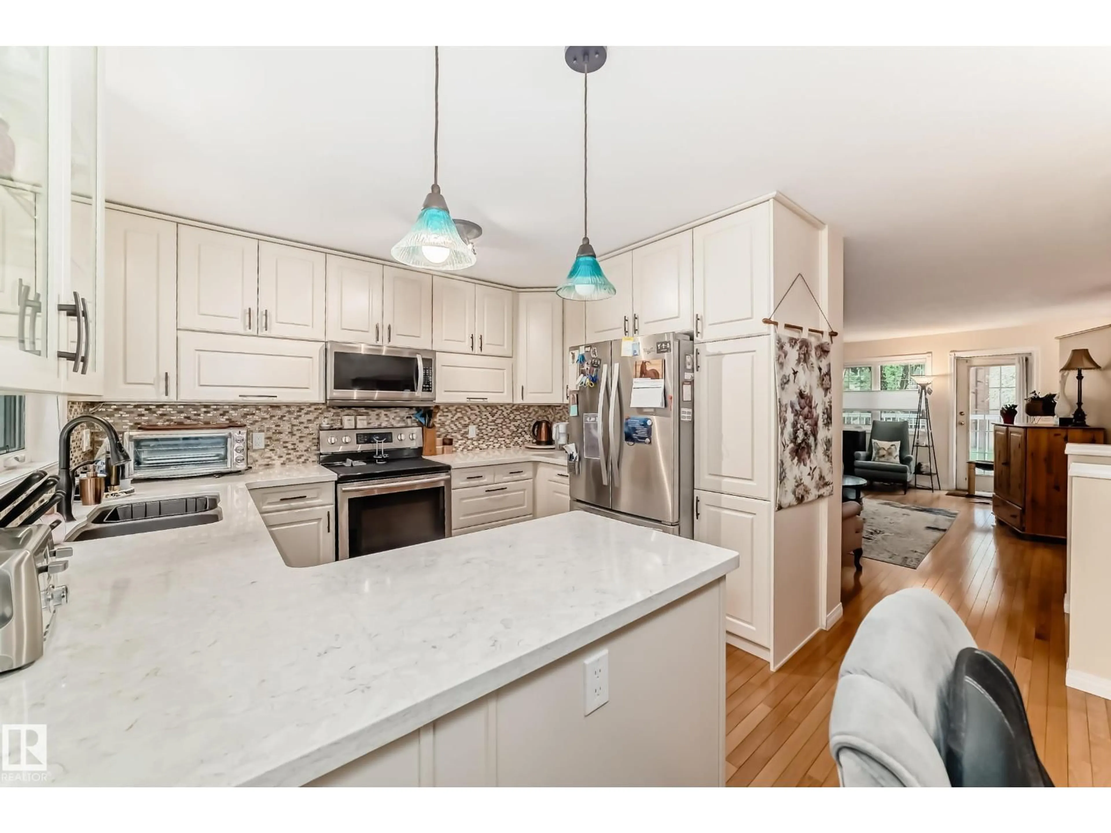 Open concept kitchen, ceramic/tile floor for 11650 103 AV, Edmonton Alberta T5K0S6