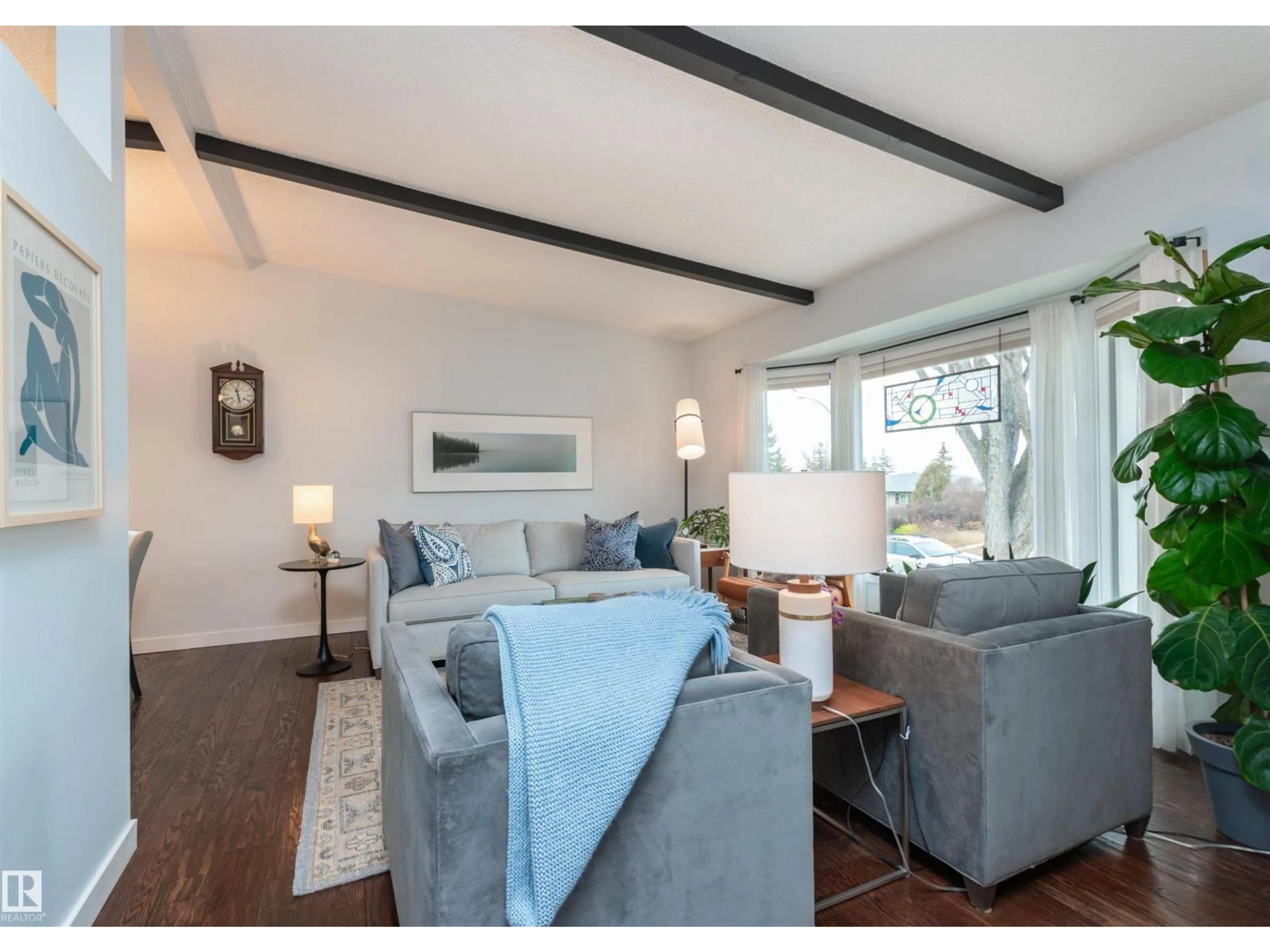 Living room with furniture, wood/laminate floor for 108 MARION DR, Sherwood Park Alberta T8A0M4