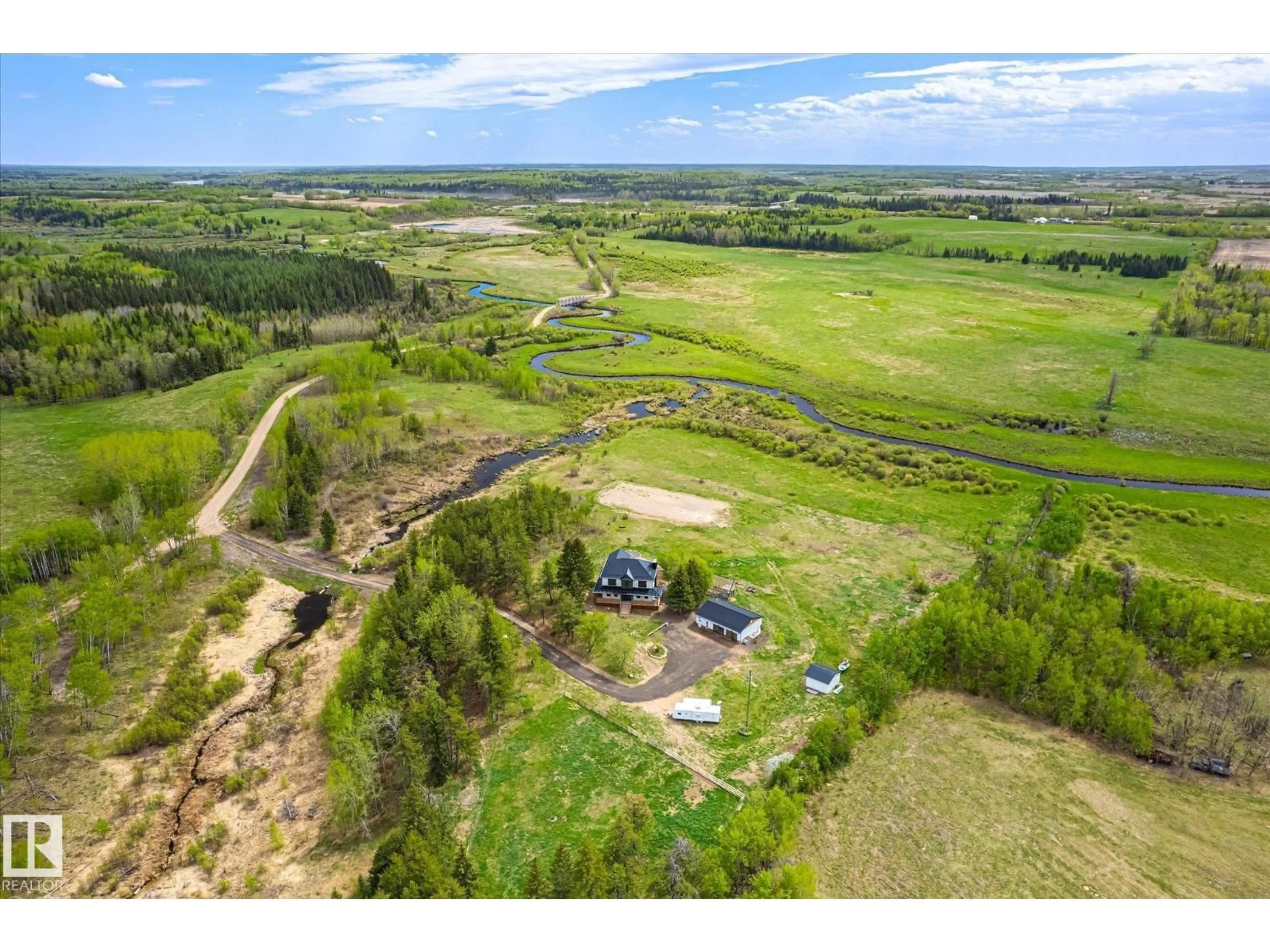 A pic from outside/outdoor area/front of a property/back of a property/a pic from drone, water/lake/river/ocean view for 59102 RGE ROAD 234, Rural Westlock County Alberta T0G2J0