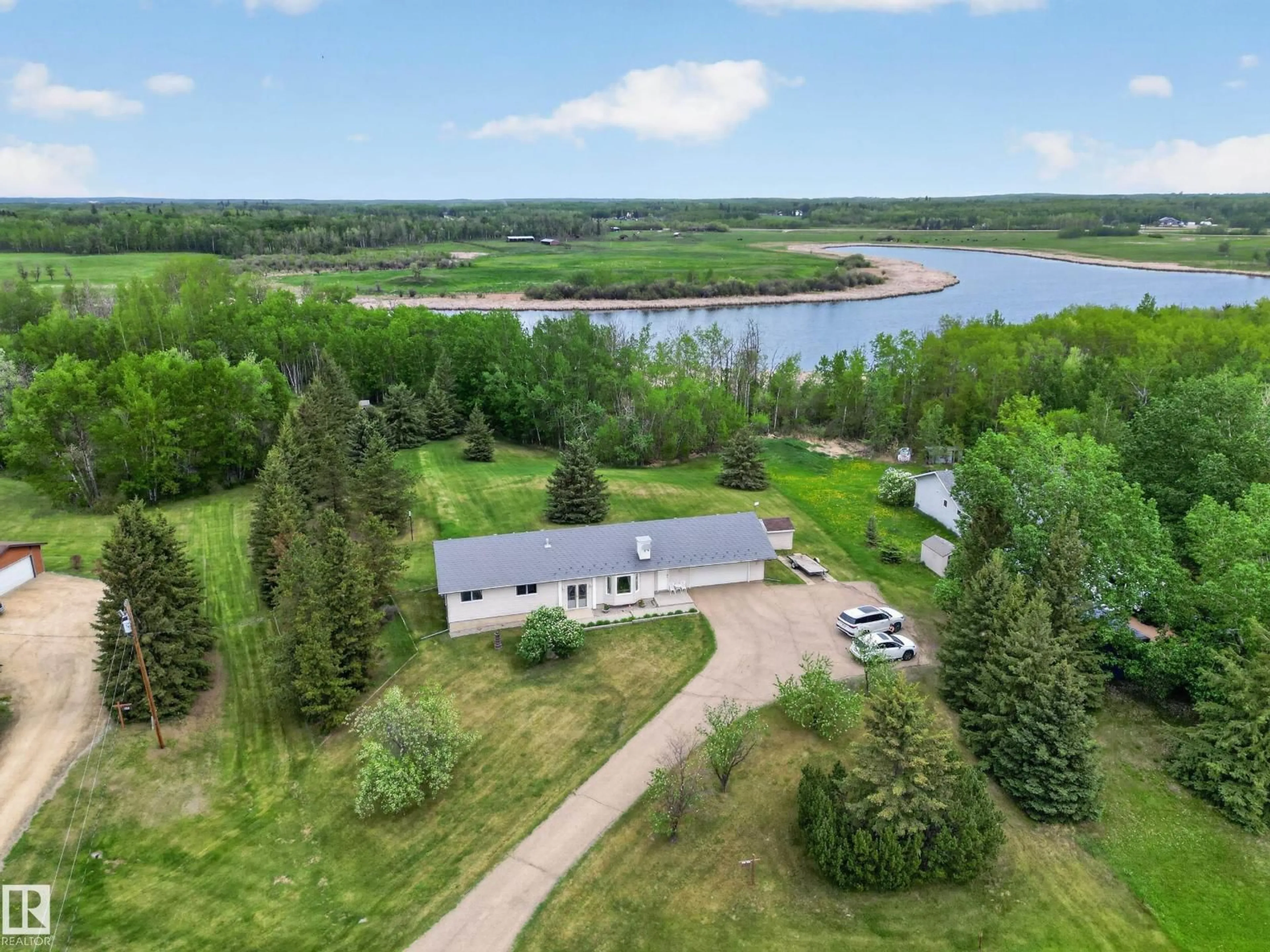 A pic from outside/outdoor area/front of a property/back of a property/a pic from drone, water/lake/river/ocean view for 52308 - 110 RR 214, Rural Strathcona County Alberta T8E1H4