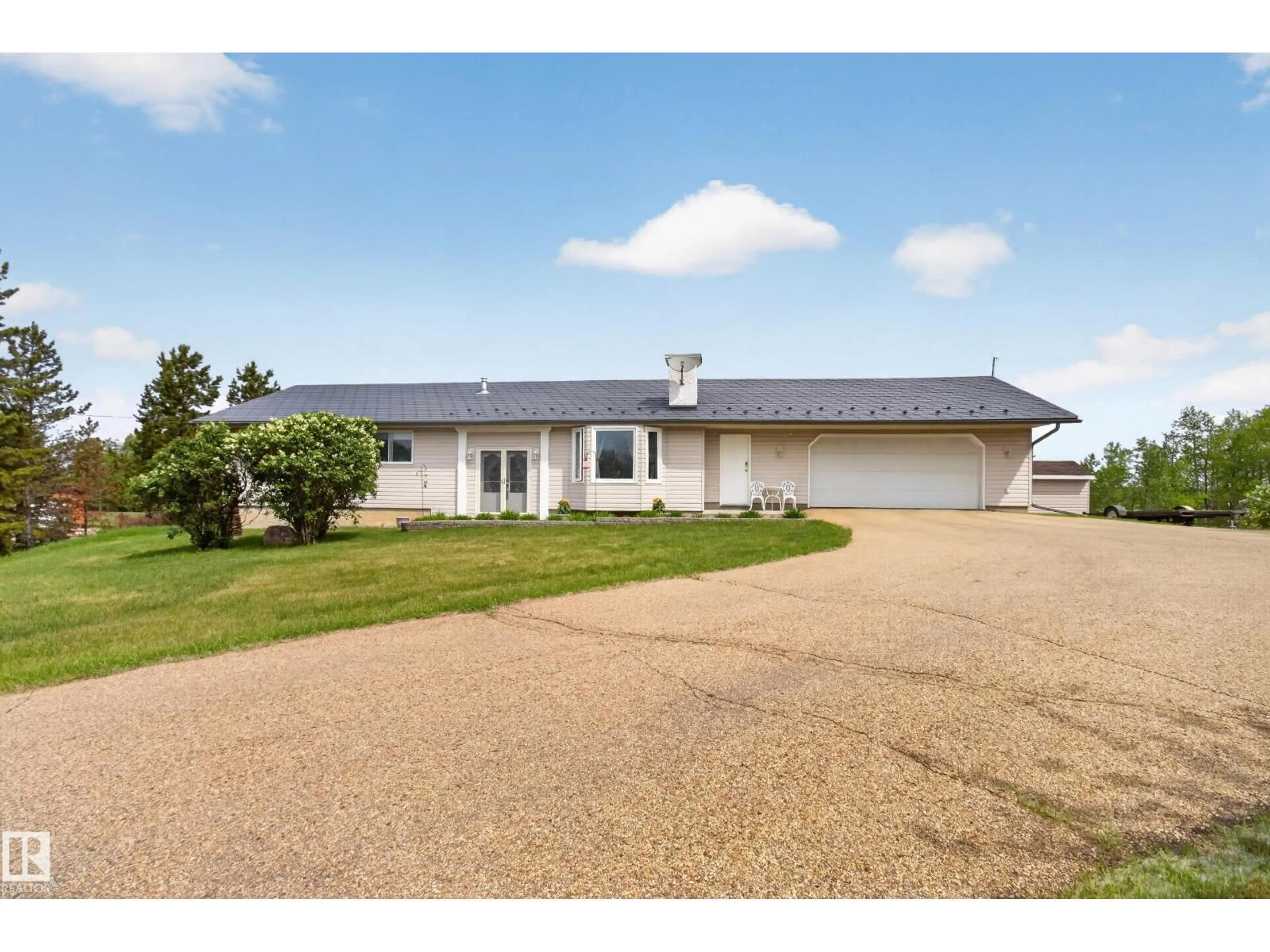 A pic from outside/outdoor area/front of a property/back of a property/a pic from drone, unknown for 52308 - 110 RR 214, Rural Strathcona County Alberta T8E1H4