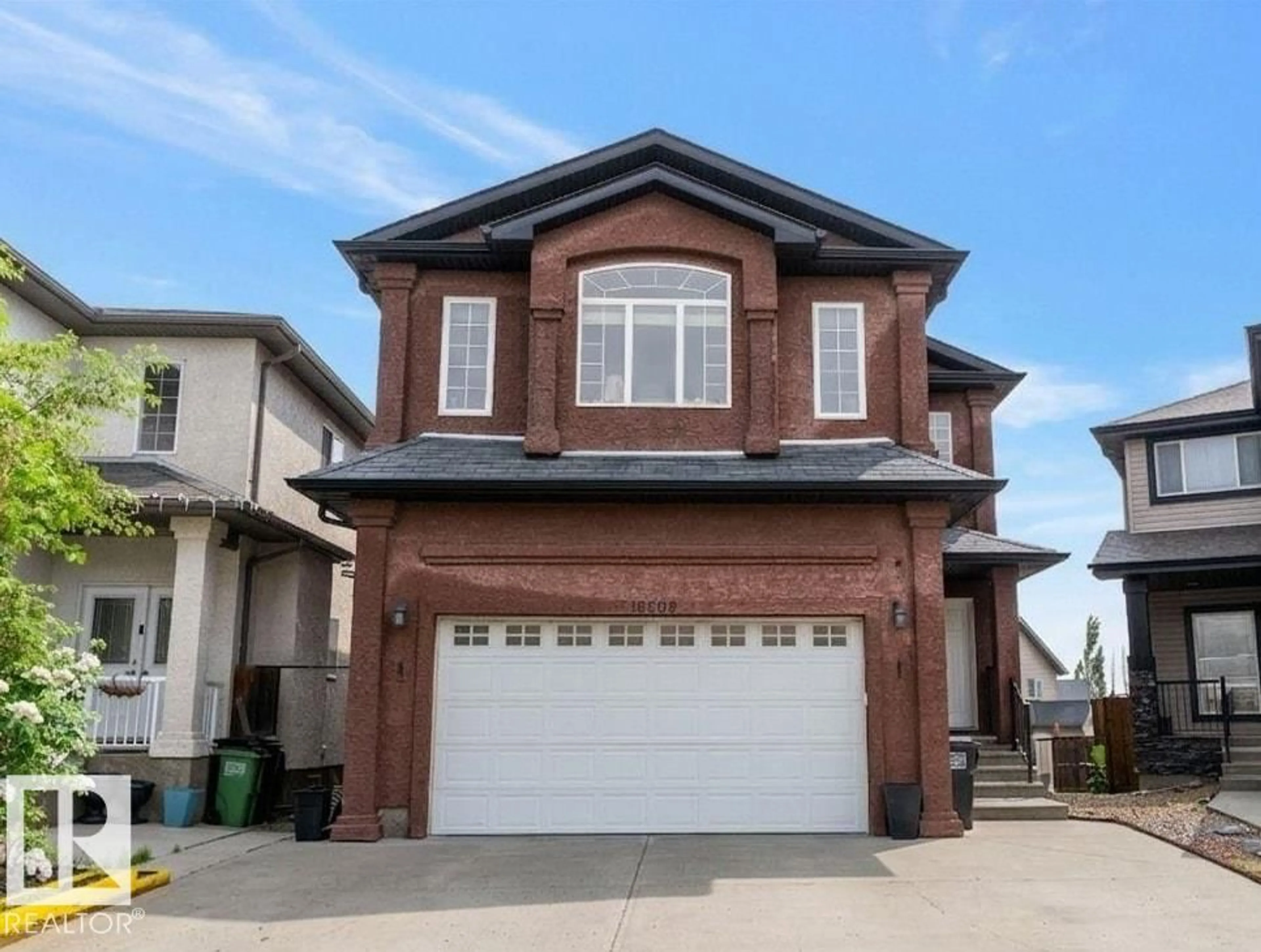 Home with brick exterior material, street for 16609 58A ST NW, Edmonton Alberta T5Y0J3