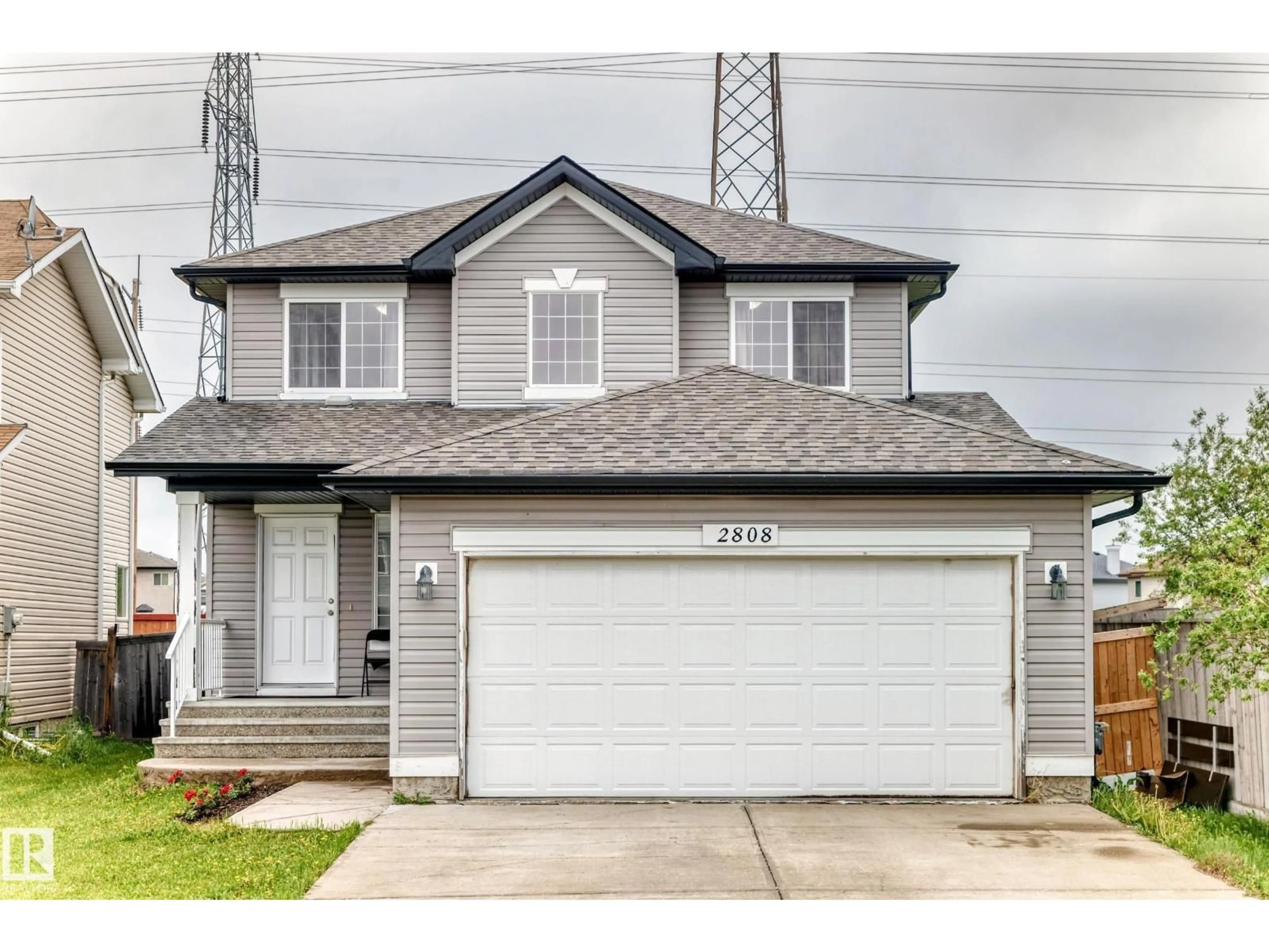 Home with vinyl exterior material, street for 2808 36 AV, Edmonton Alberta T6T0H7