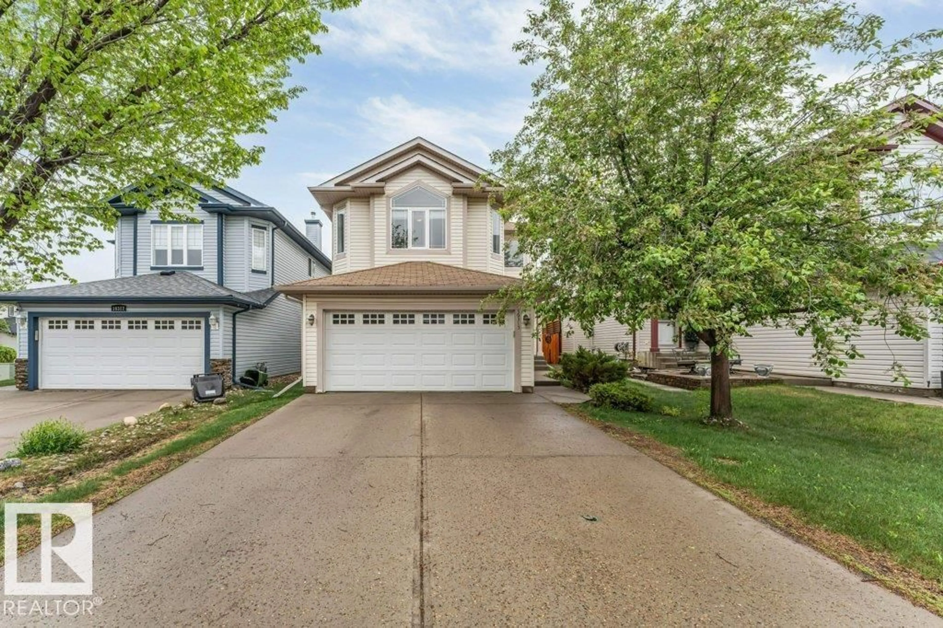 Home with vinyl exterior material, street for 16315 55 ST, Edmonton Alberta T5Y3K9