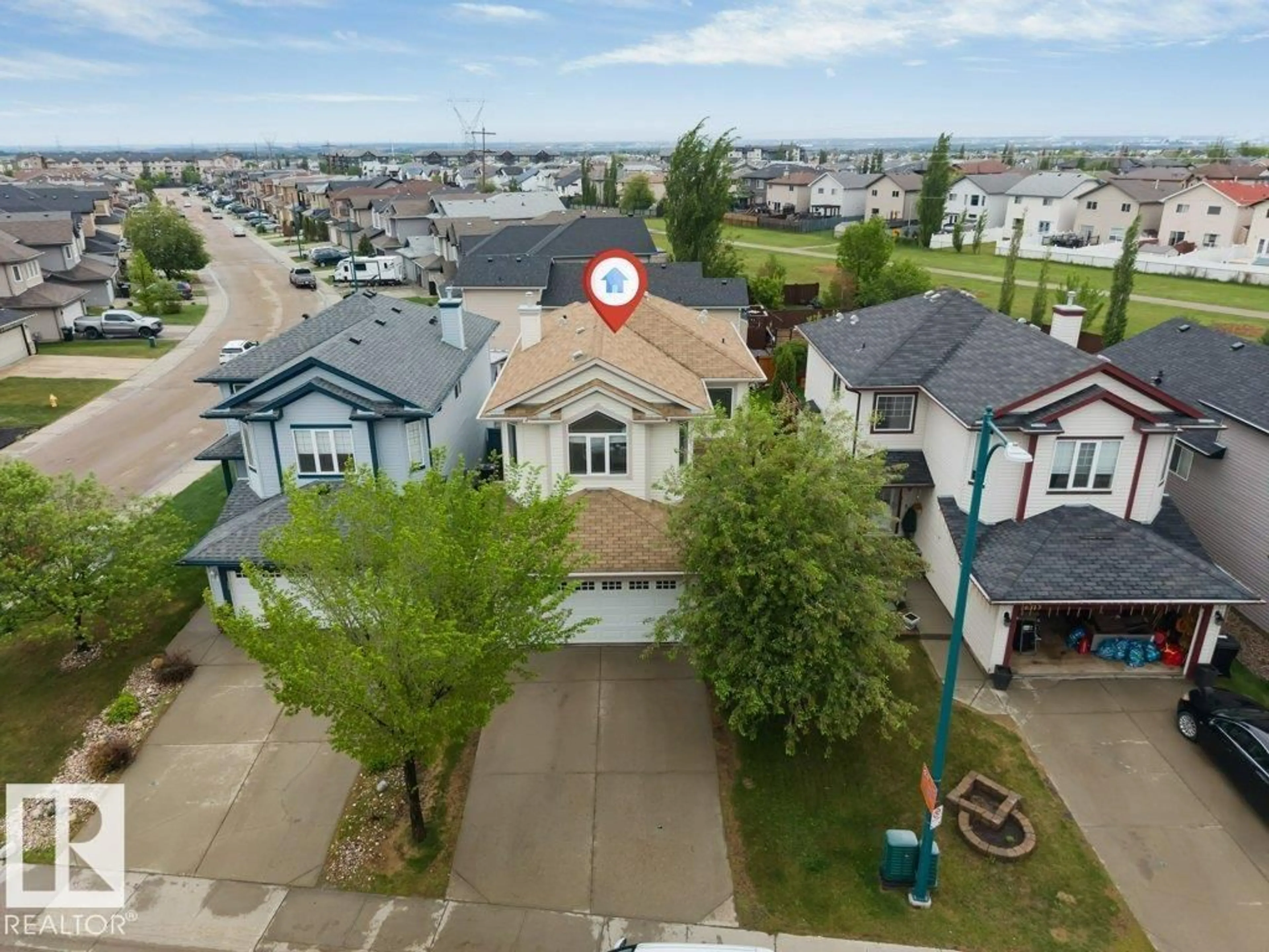 A pic from outside/outdoor area/front of a property/back of a property/a pic from drone, unknown for 16315 55 ST, Edmonton Alberta T5Y3K9