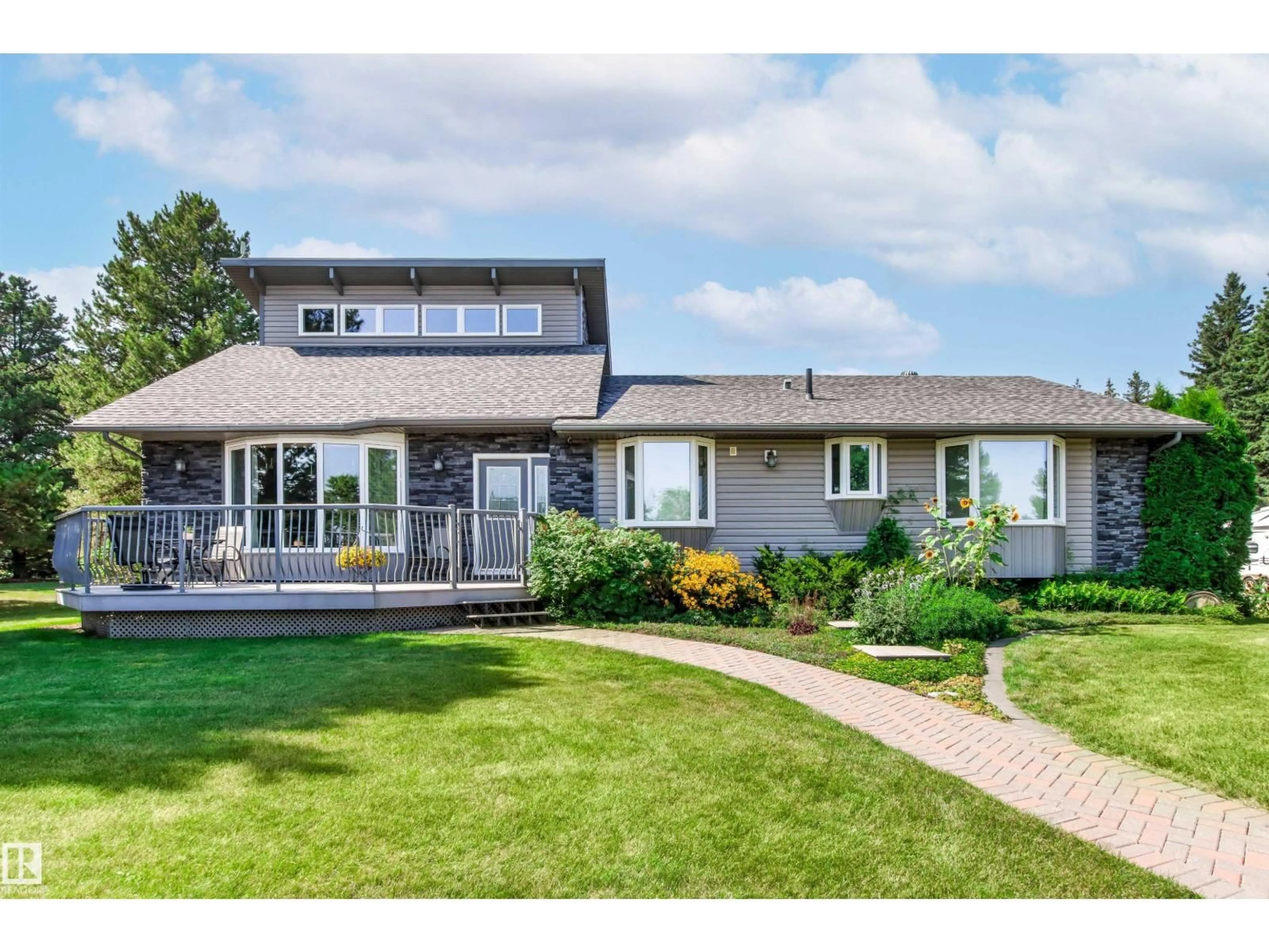 Home with vinyl exterior material, street for 35 24213 TWP ROAD ROAD, Rural Sturgeon County Alberta T8T1X9