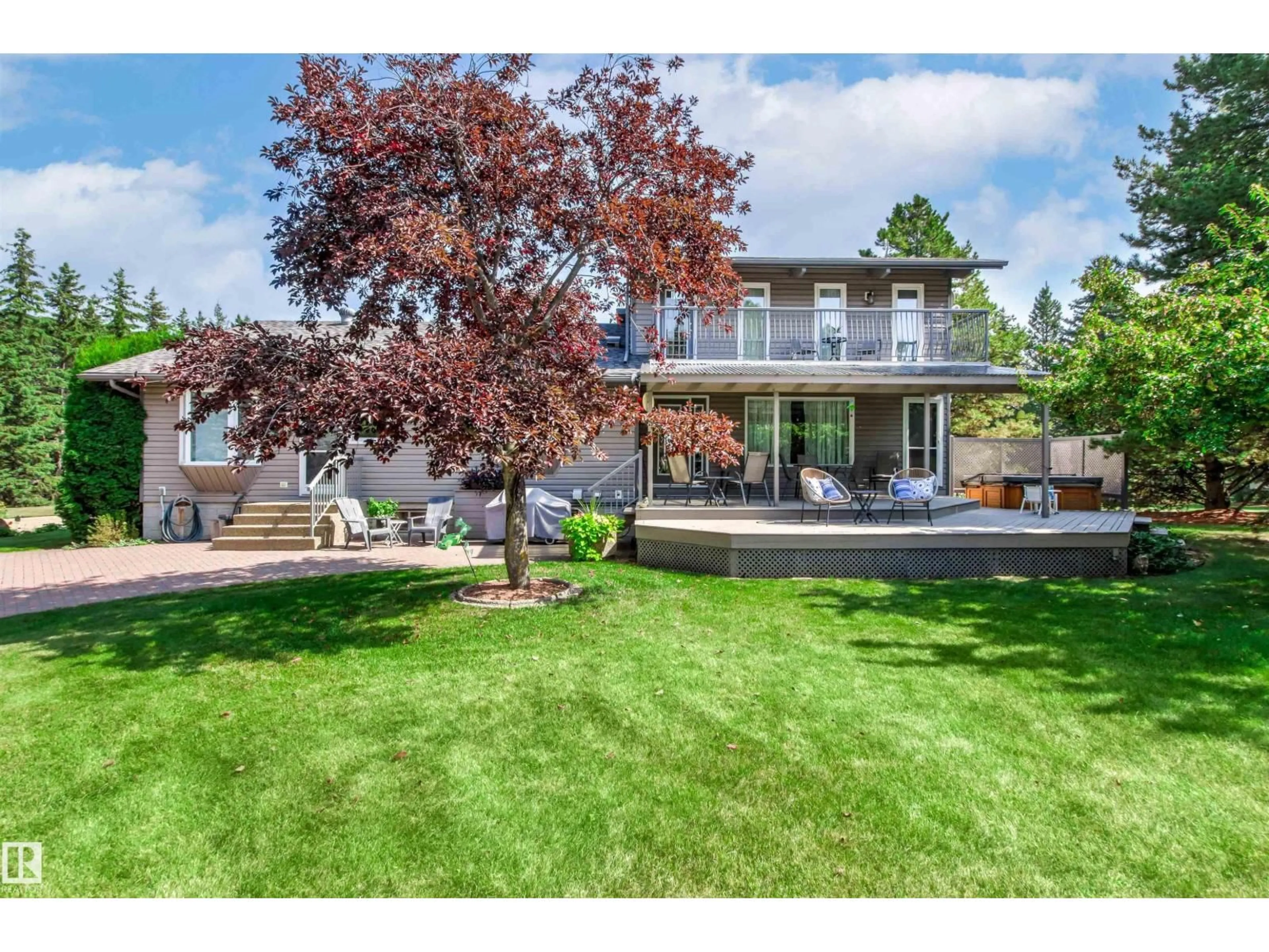 A pic from outside/outdoor area/front of a property/back of a property/a pic from drone, mountain view for 35 24213 TWP ROAD ROAD, Rural Sturgeon County Alberta T8T1X9