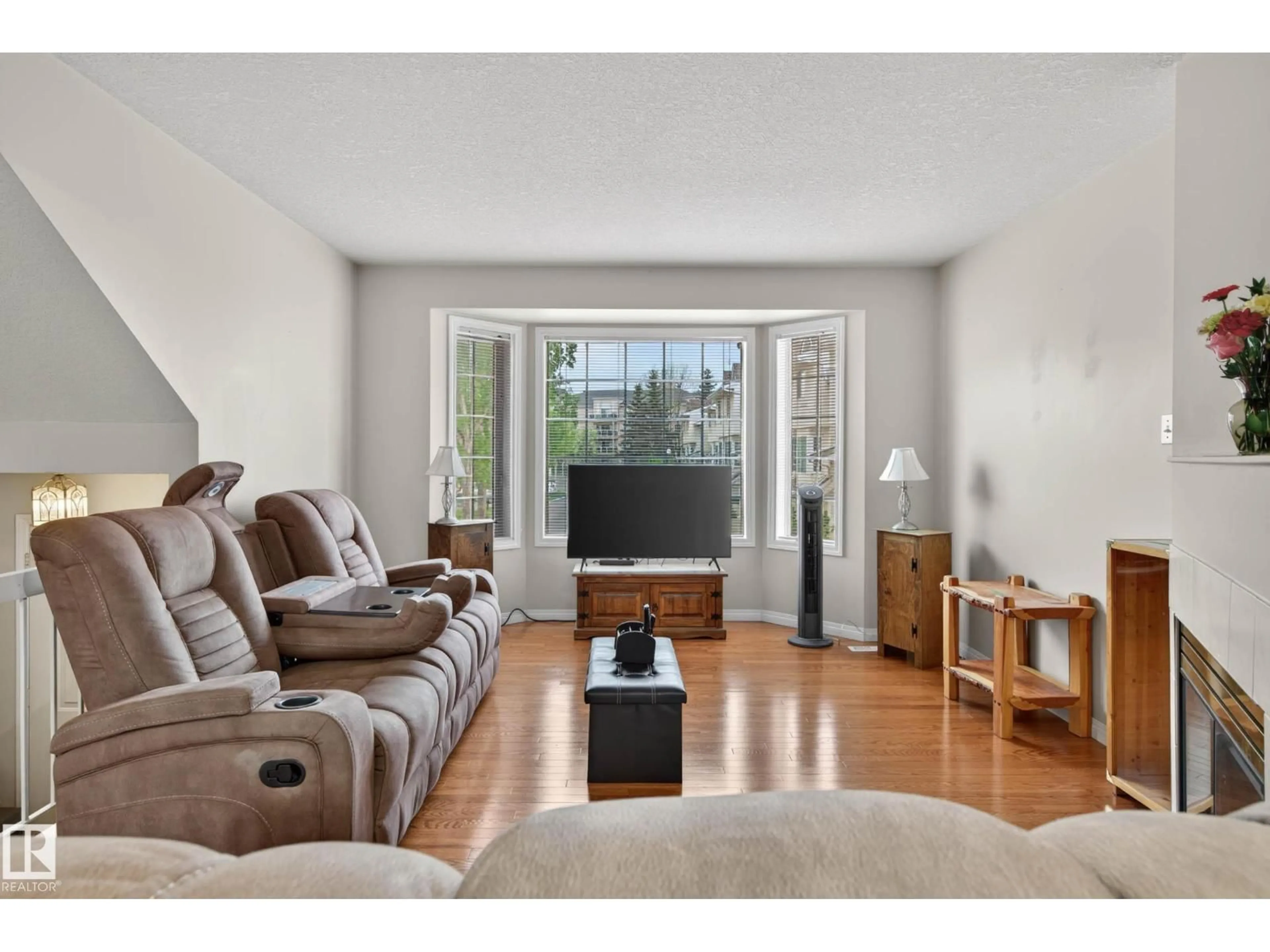Living room with furniture, wood/laminate floor for #16 - 9703 174 ST, Edmonton Alberta T5T6C5