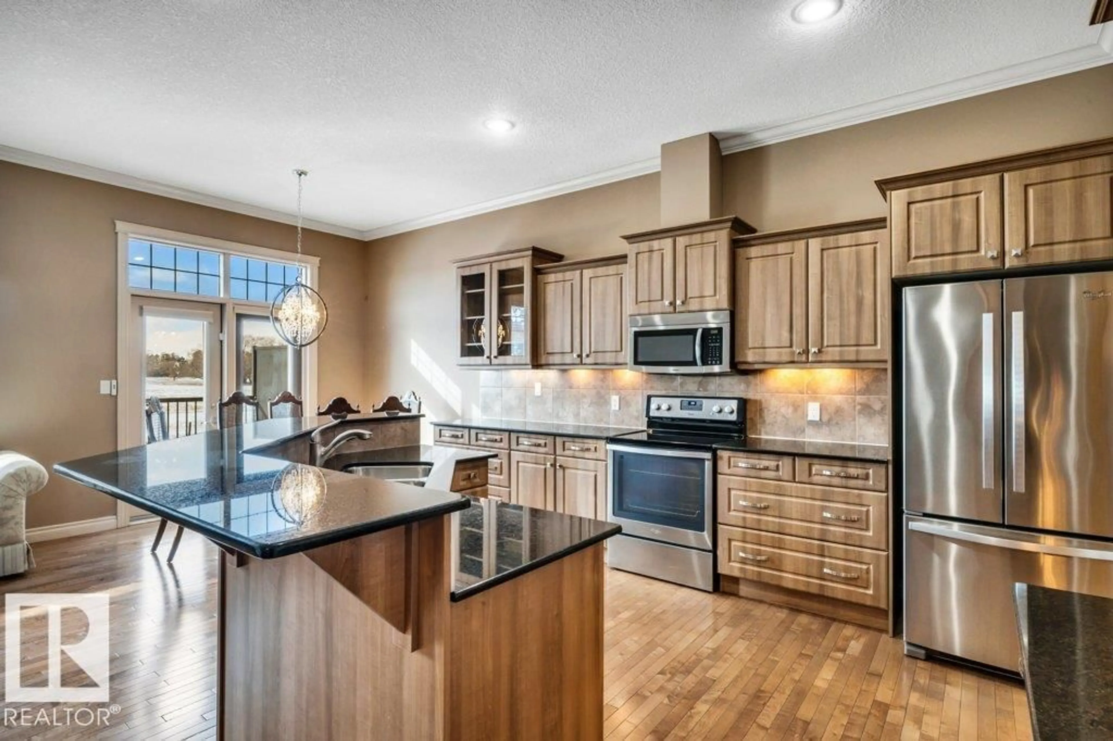 Open concept kitchen, ceramic/tile floor for #17 - 12610 15 AV, Edmonton Alberta T6W1X1