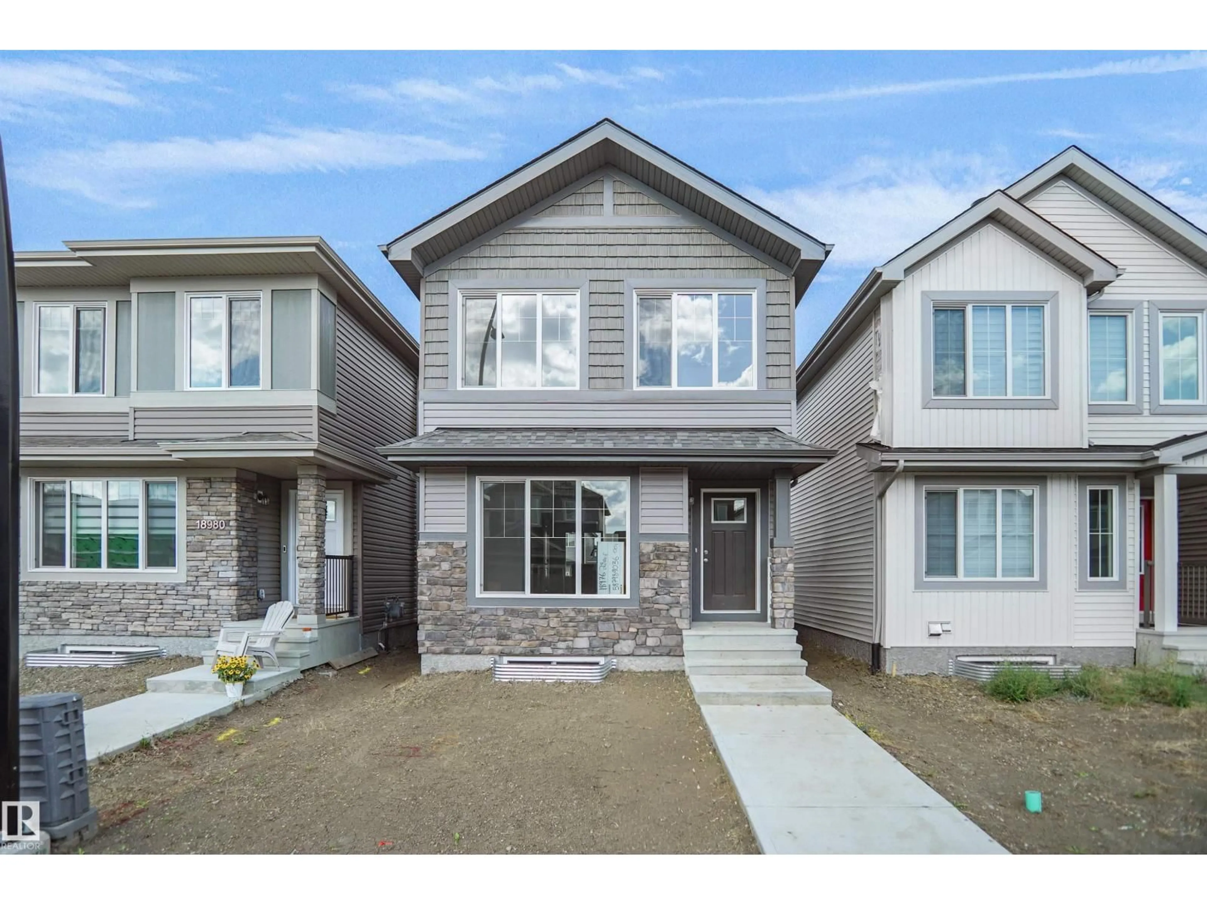 Home with brick exterior material, street for 18976 28 AV, Edmonton Alberta T5Y4G2