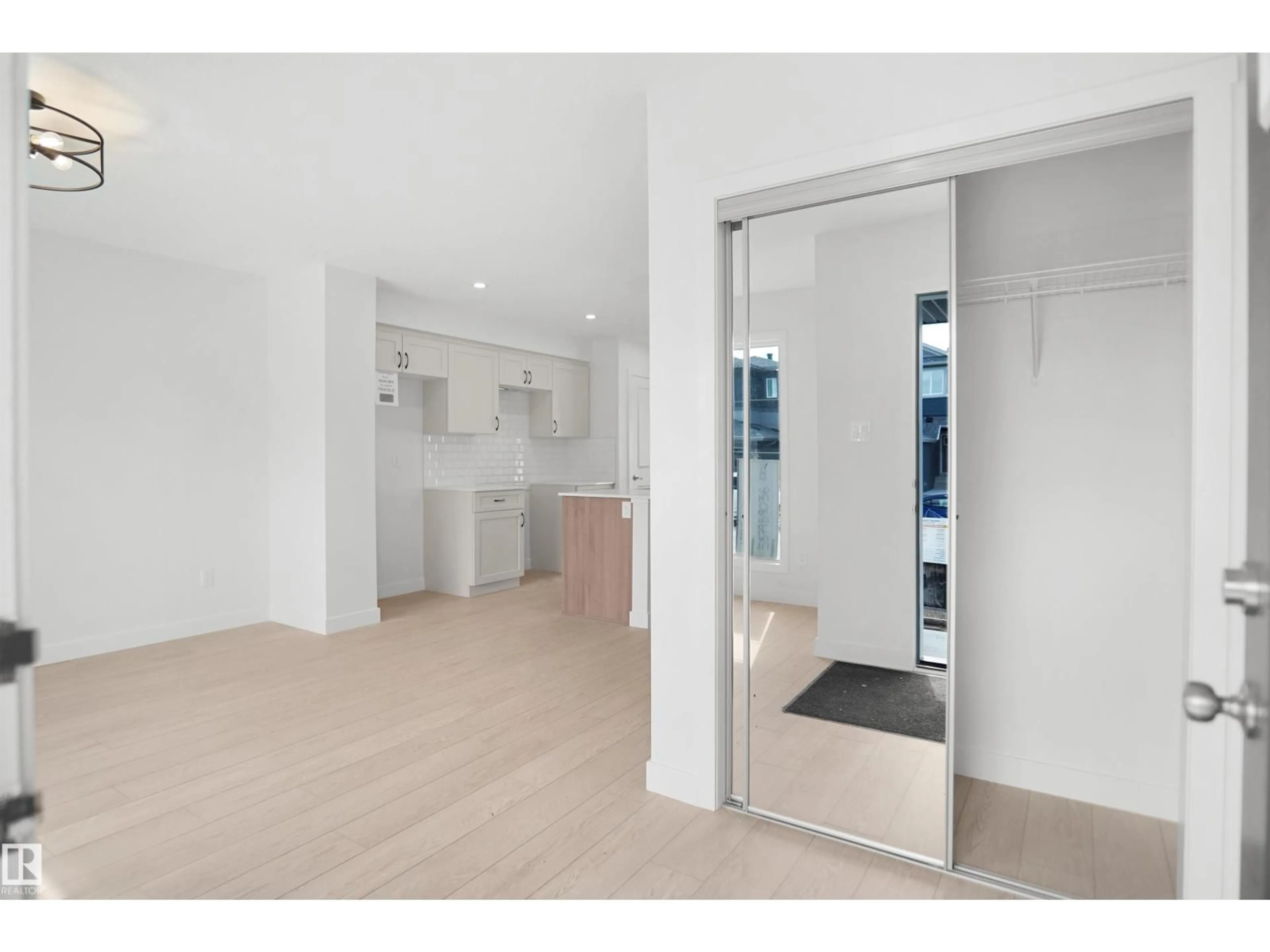 Indoor foyer for 18976 28 AV, Edmonton Alberta T5Y4G2