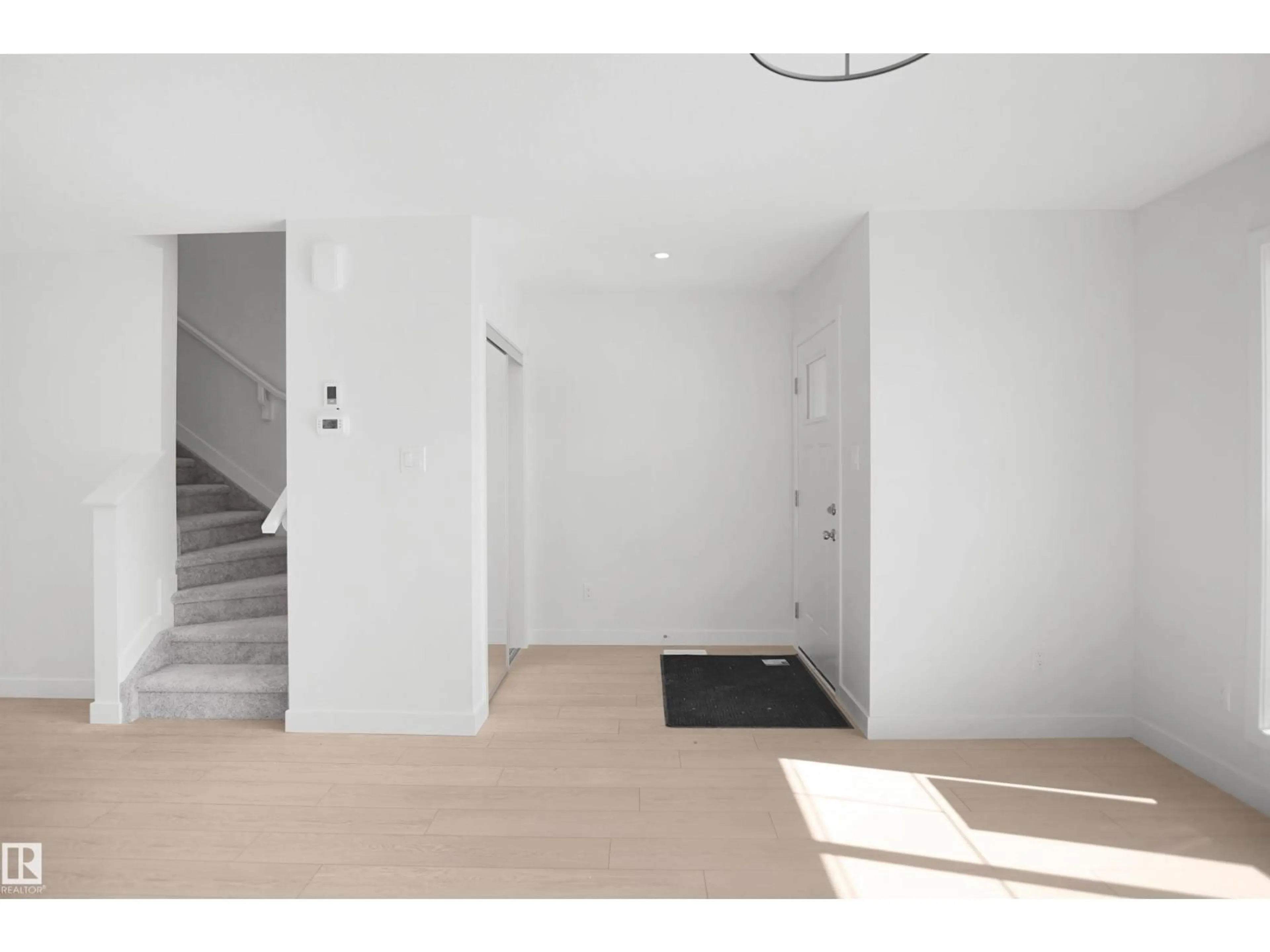 Indoor foyer for 18976 28 AV, Edmonton Alberta T5Y4G2