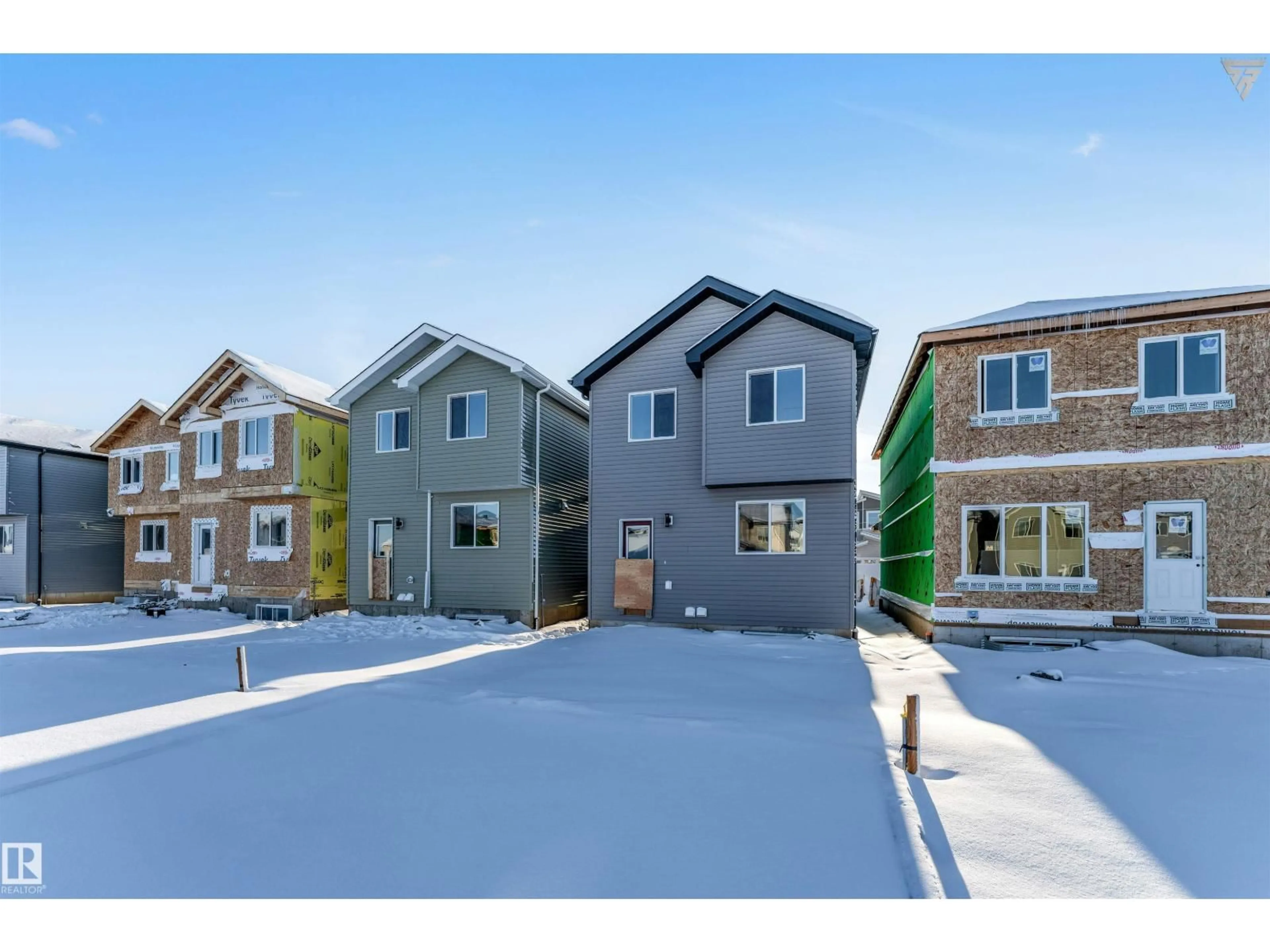 Home with vinyl exterior material, street for NW - 1224 14 AV, Edmonton Alberta T6T2W2