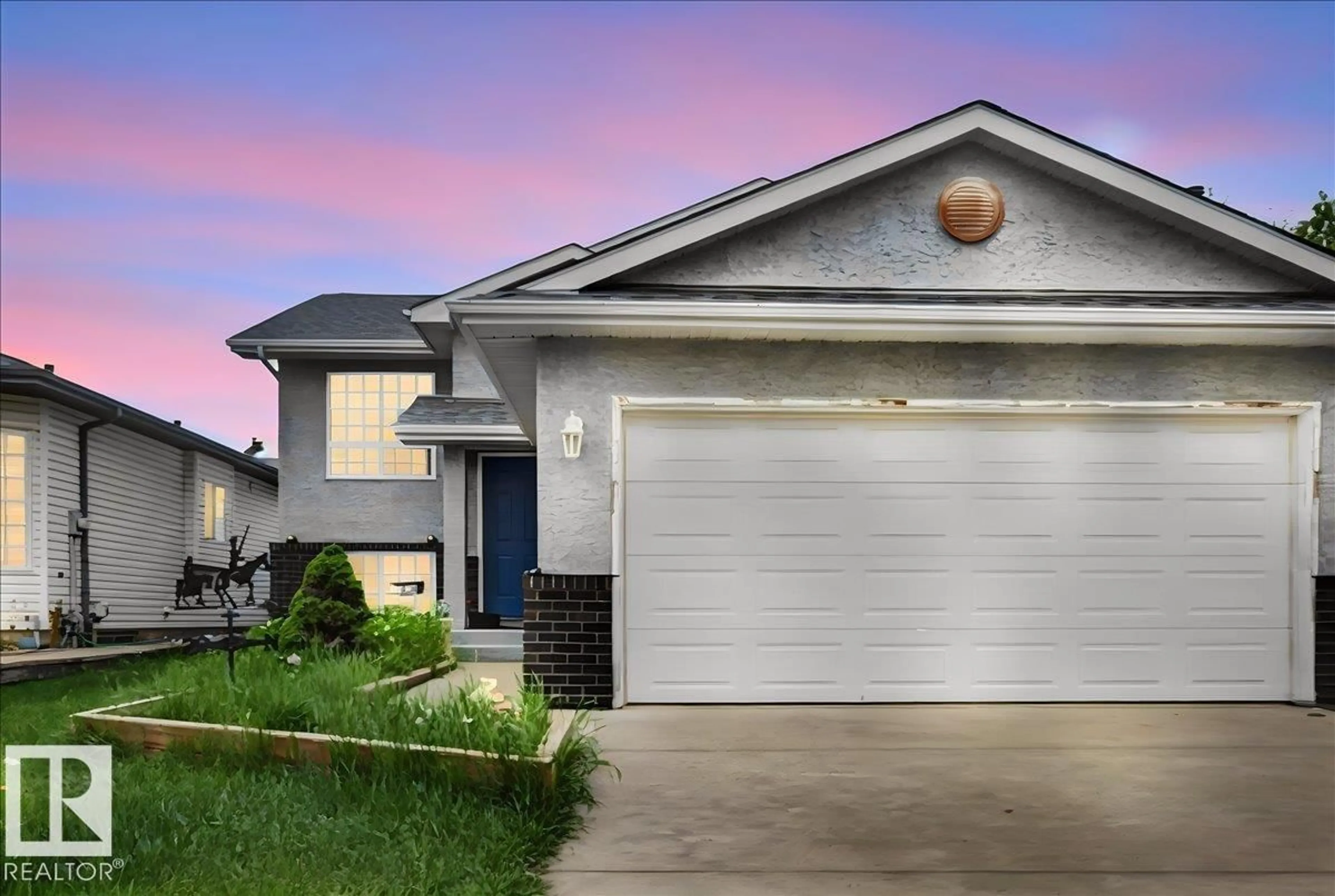 Home with vinyl exterior material, street for 5108 138A AV, Edmonton Alberta T5A4Z6