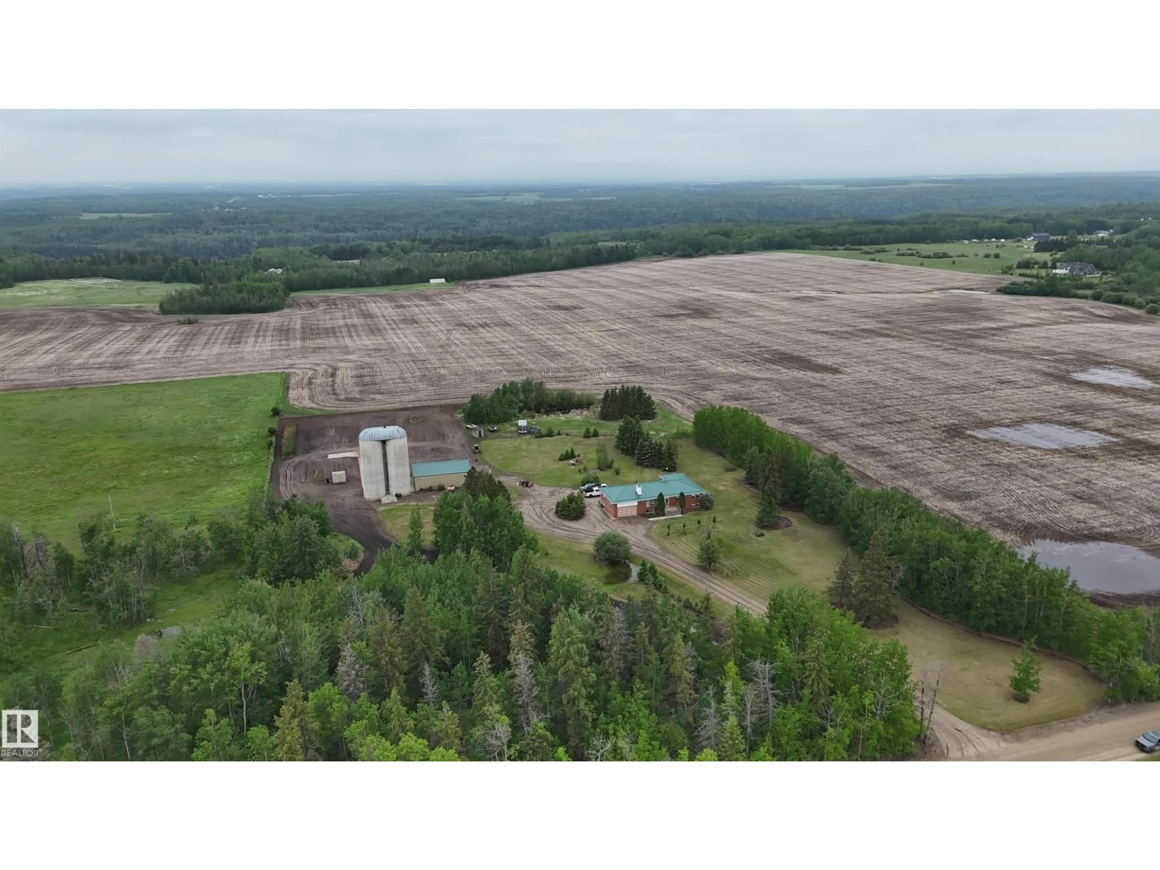 A pic from outside/outdoor area/front of a property/back of a property/a pic from drone, forest/trees view for 1307 TWP ROAD 510, Rural Parkland County Alberta T7Y2N2