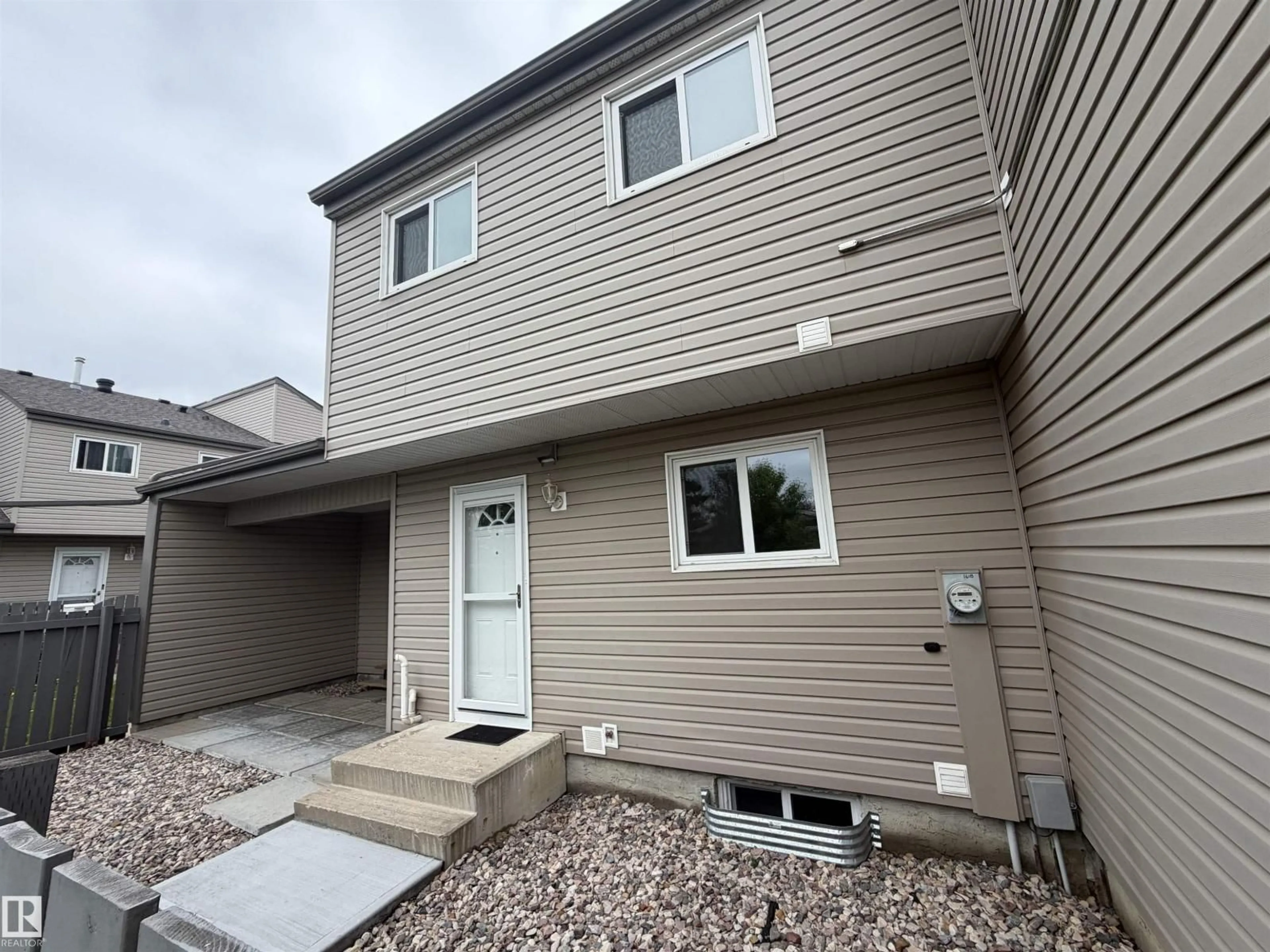 Home with vinyl exterior material, street for 1618 LAKEWOOD RD, Edmonton Alberta T6K3H4