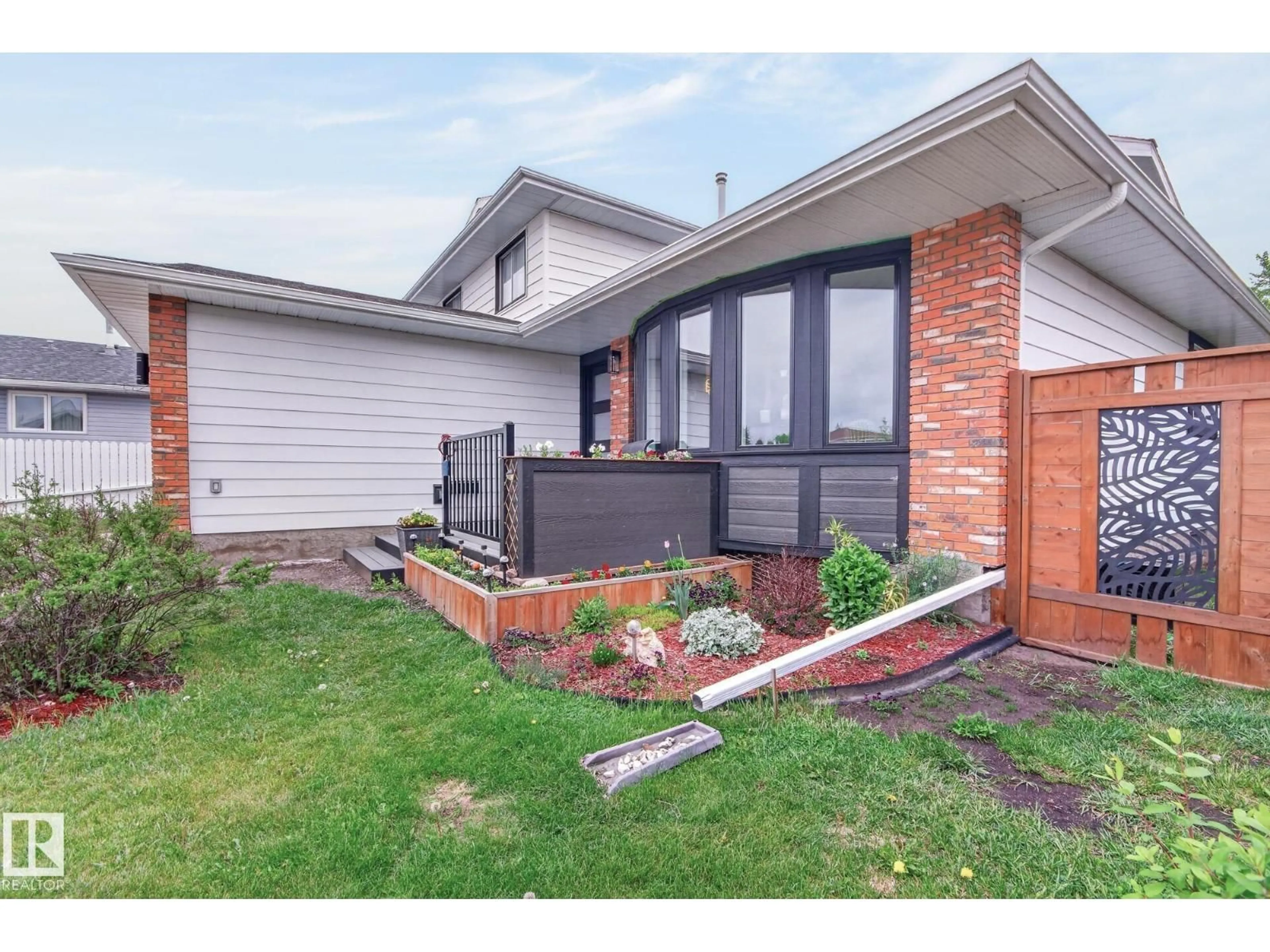 Home with brick exterior material, street for 101 HILLSIDE PL, Millet Alberta T0C1Z0