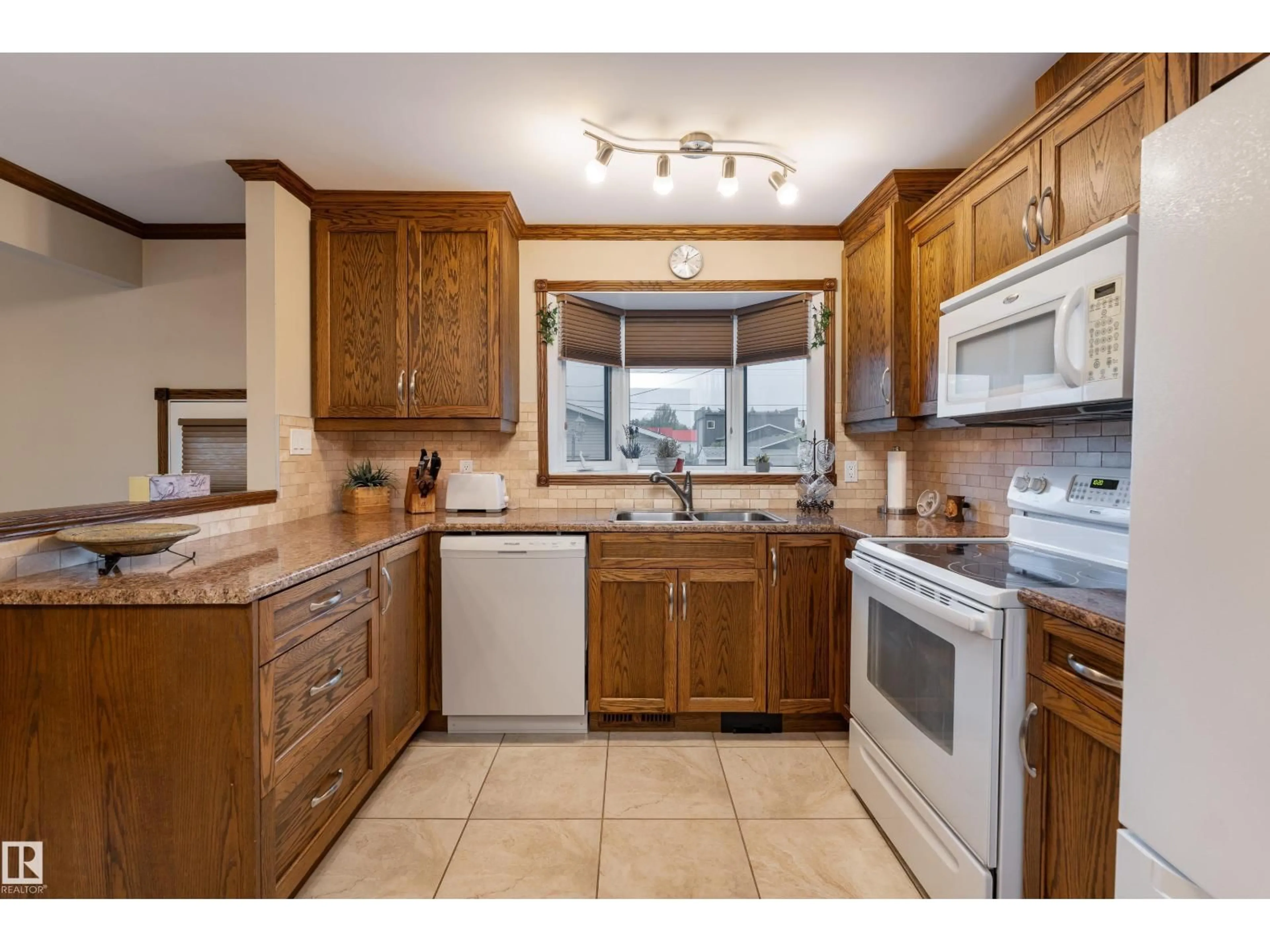 Standard kitchen, ceramic/tile floor for 9906 99 ST, Morinville Alberta T8R1G5