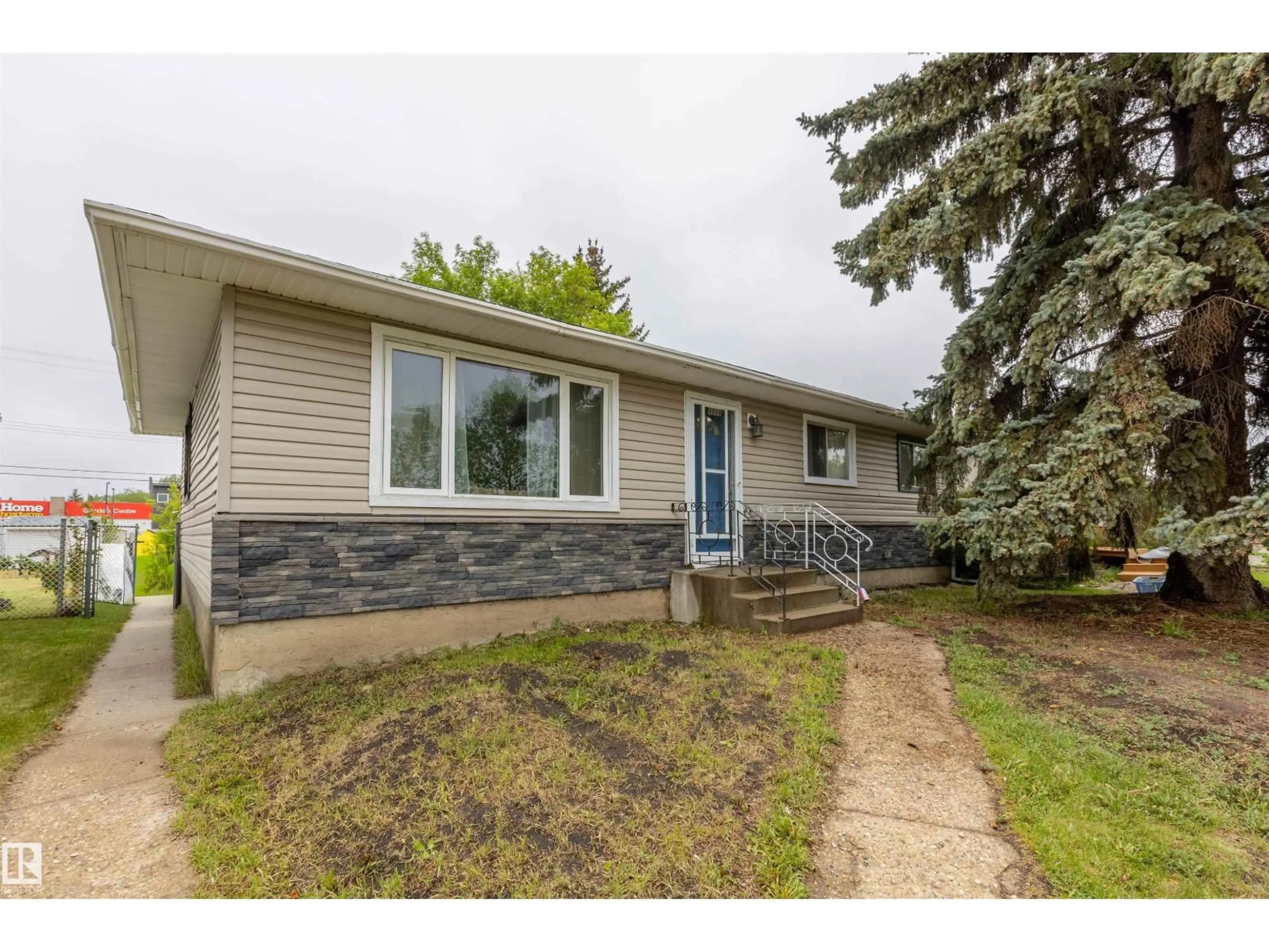 Home with vinyl exterior material, street for 9908 99 ST, Morinville Alberta T8R1G5