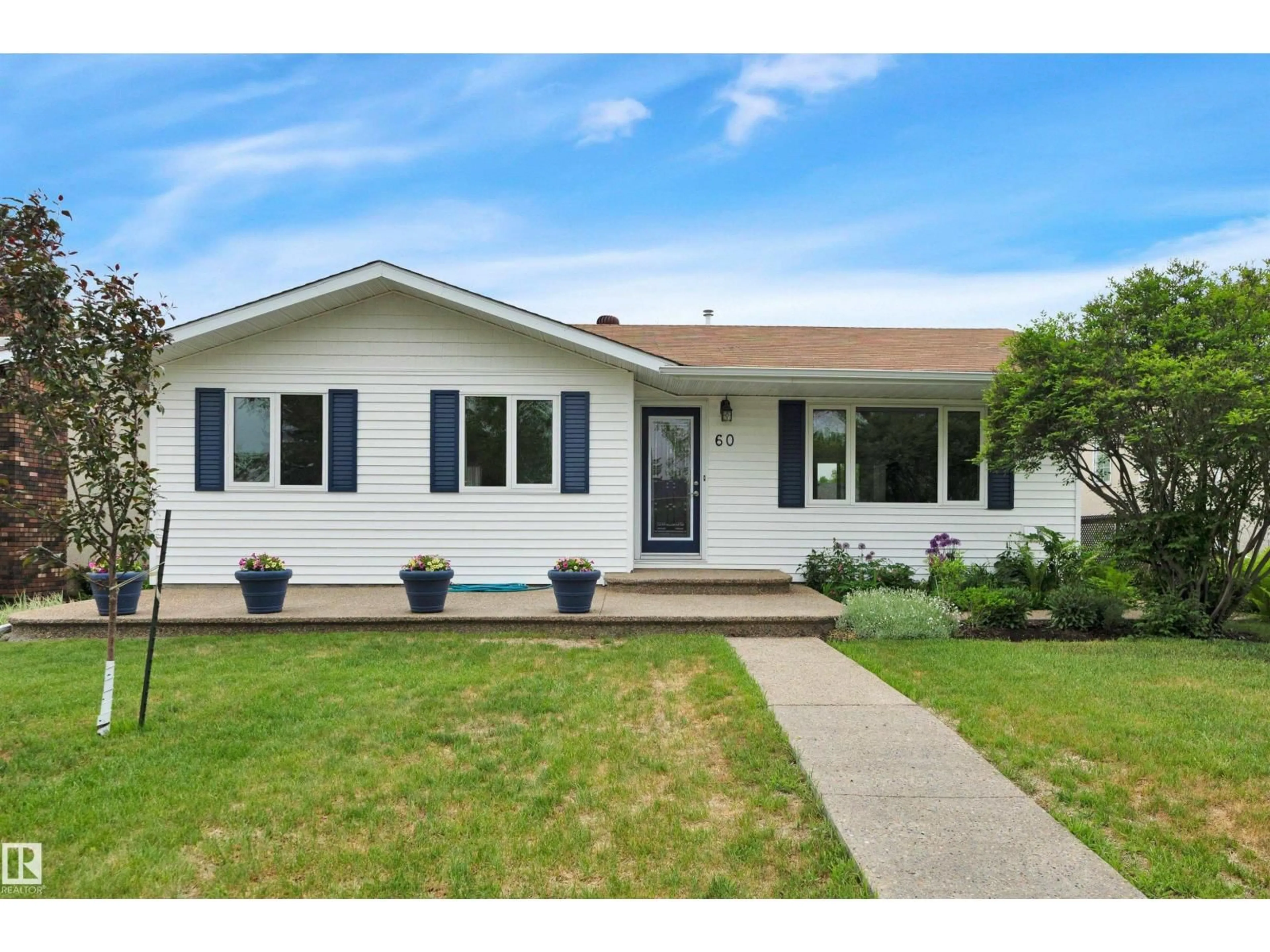 Home with vinyl exterior material, street for 60 CORINTHIA DR, Leduc Alberta T9E4M6