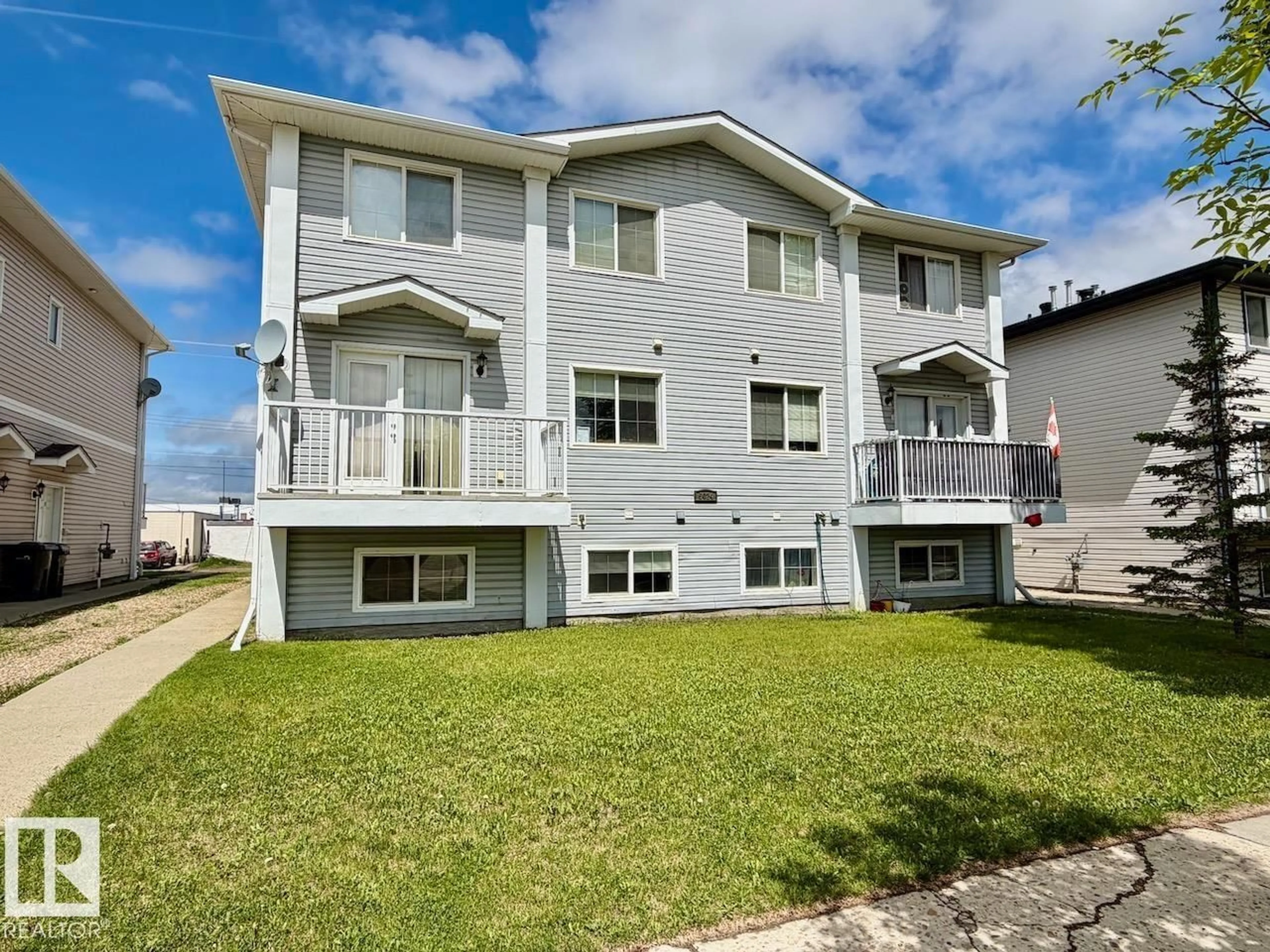 Home with vinyl exterior material, water/lake/river/ocean view for 8 - 5025 50 AV, Drayton Valley Alberta T7A1J7