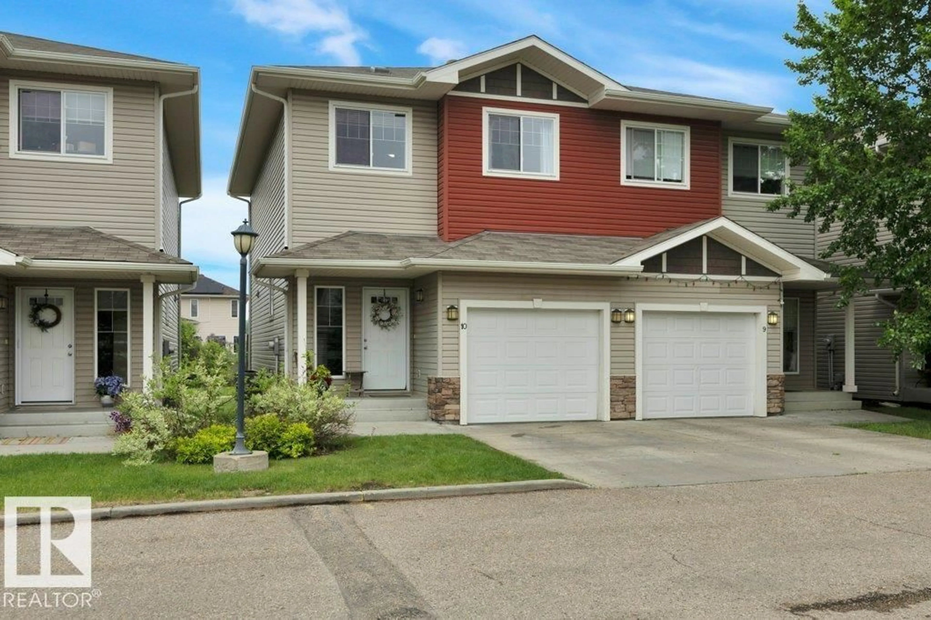 Home with vinyl exterior material, street for #10 - 15151 43 ST, Edmonton Alberta T5Y0L3