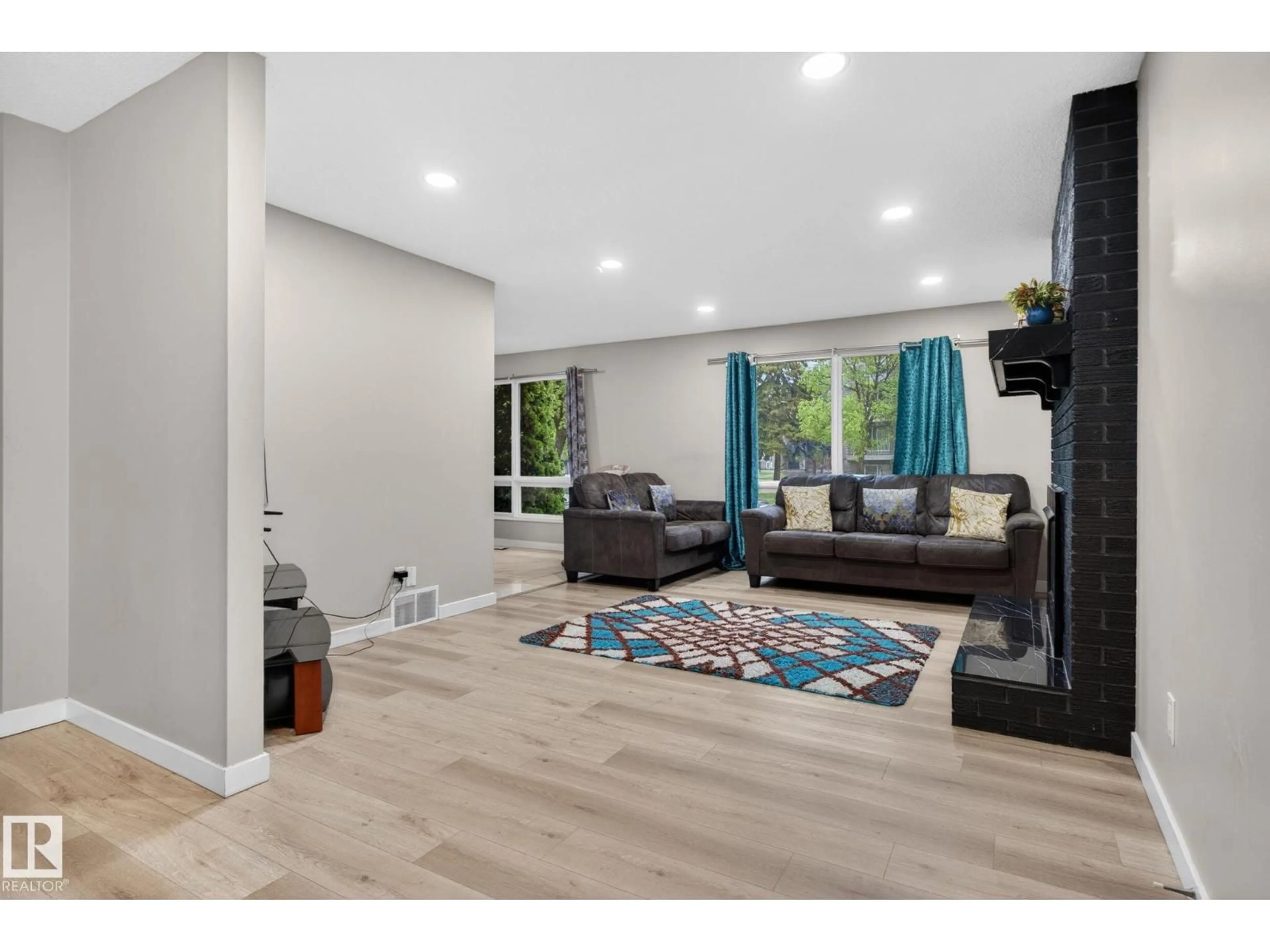 Living room with furniture, unknown for NW - 14332 121 ST, Edmonton Alberta T5X3P7