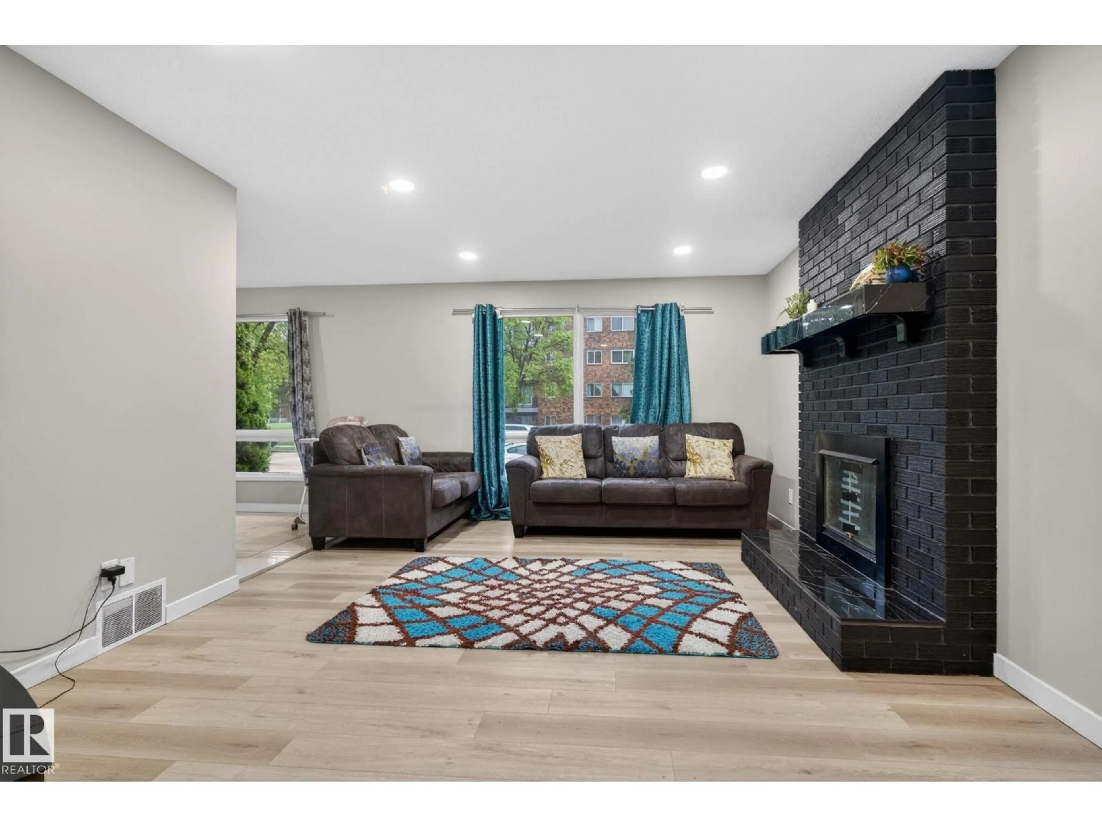 Living room with furniture, unknown for NW - 14332 121 ST, Edmonton Alberta T5X3P7