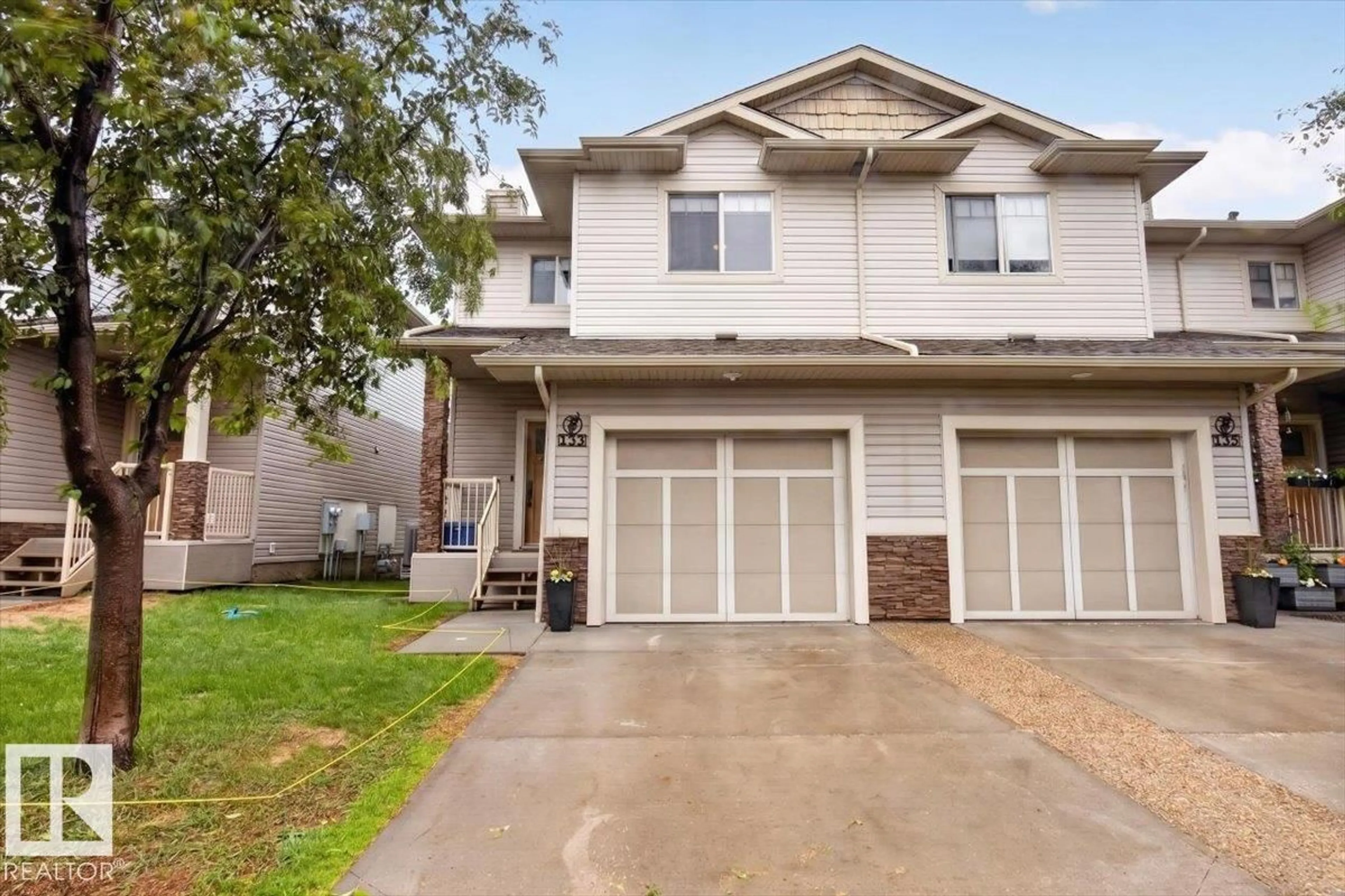 Home with vinyl exterior material, street for 5420 - 133 GRANT MACEWAN BV, Leduc Alberta T9E0M1
