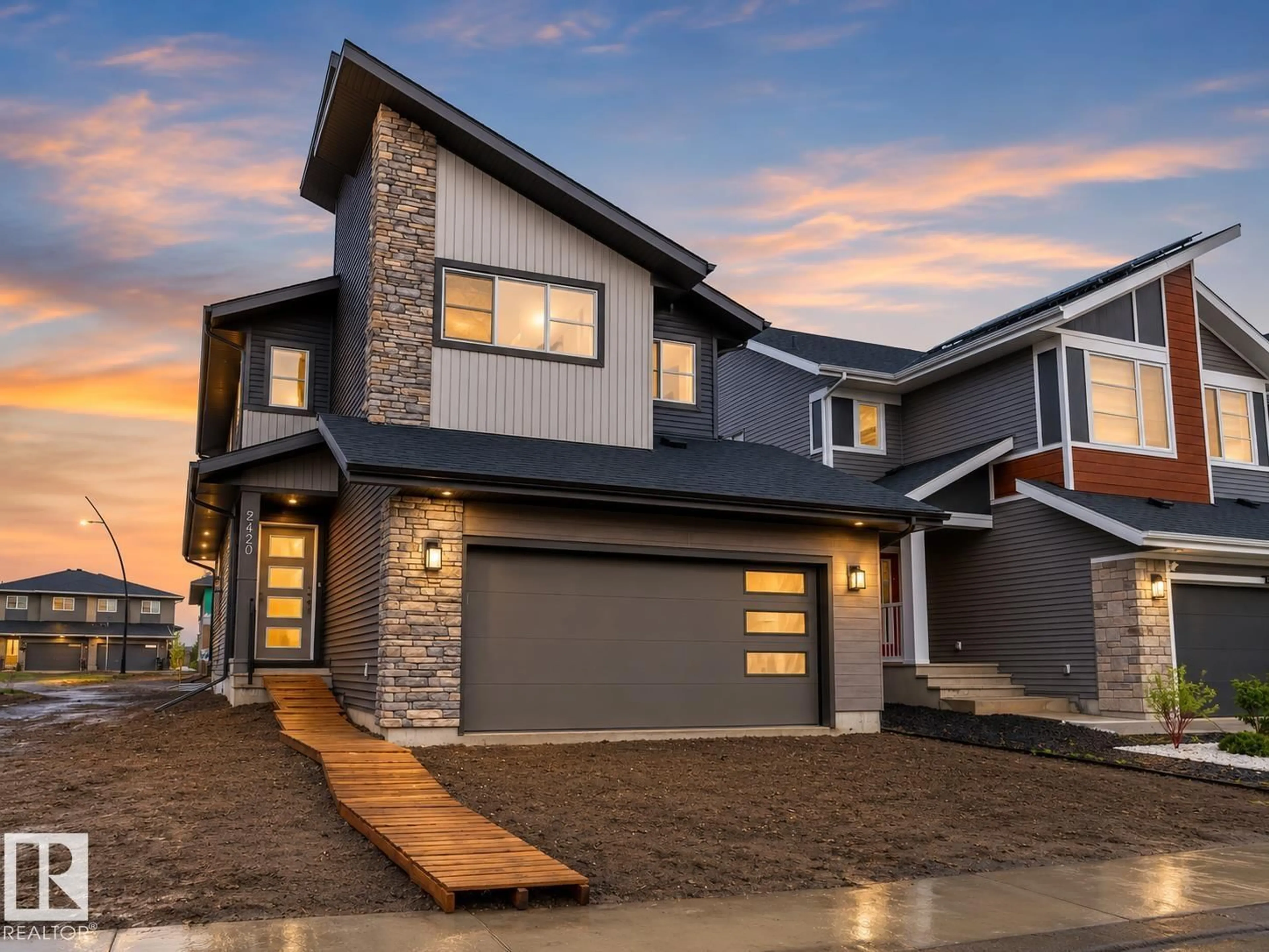 Home with brick exterior material, street for NW - 2420 205 ST, Edmonton Alberta T6M1N6
