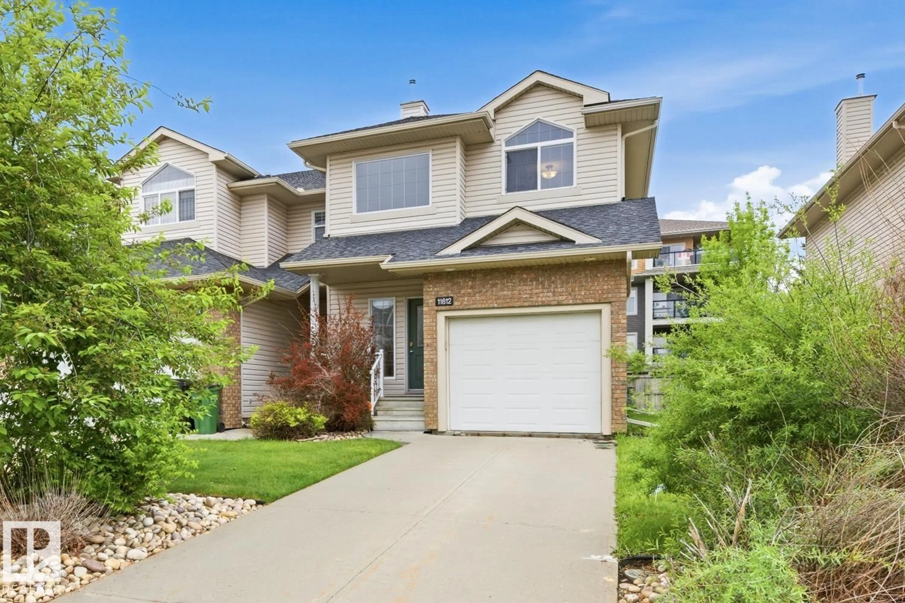 Home with vinyl exterior material, street for SW - 11612 11 AV, Edmonton Alberta T6W1W8