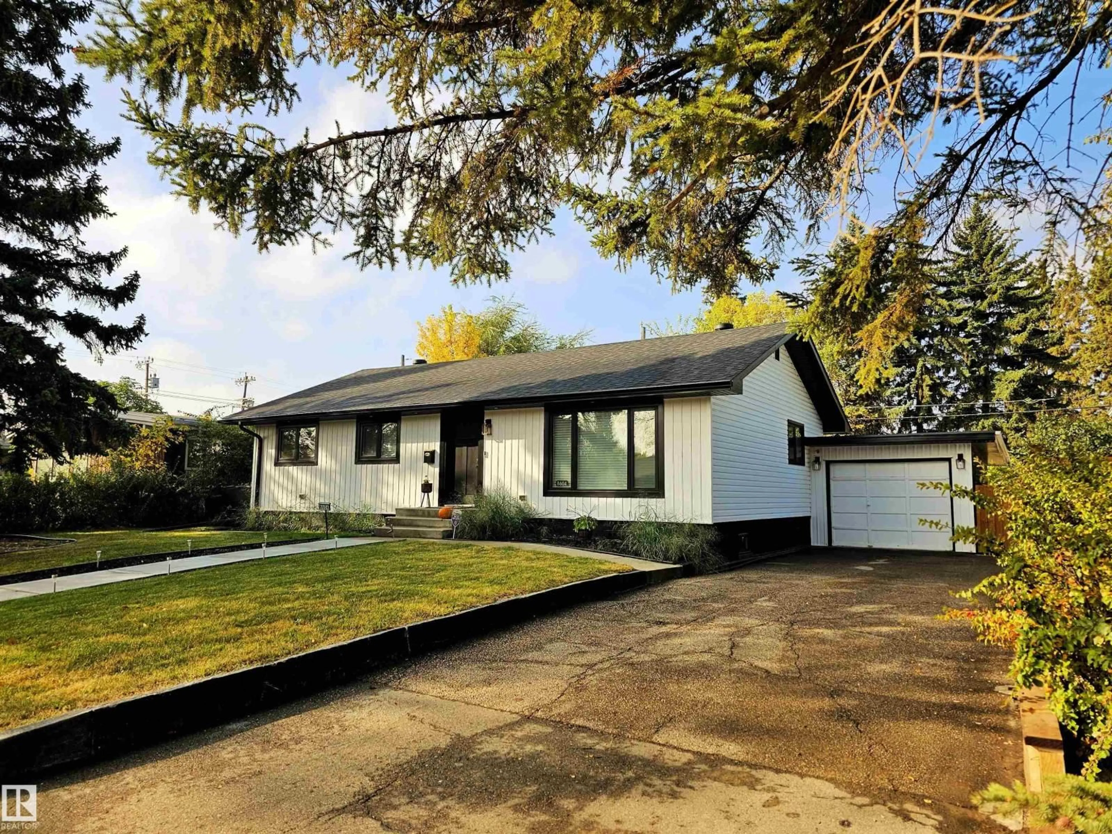 Home with vinyl exterior material, street for 8604 142 ST, Edmonton Alberta T5R0M1