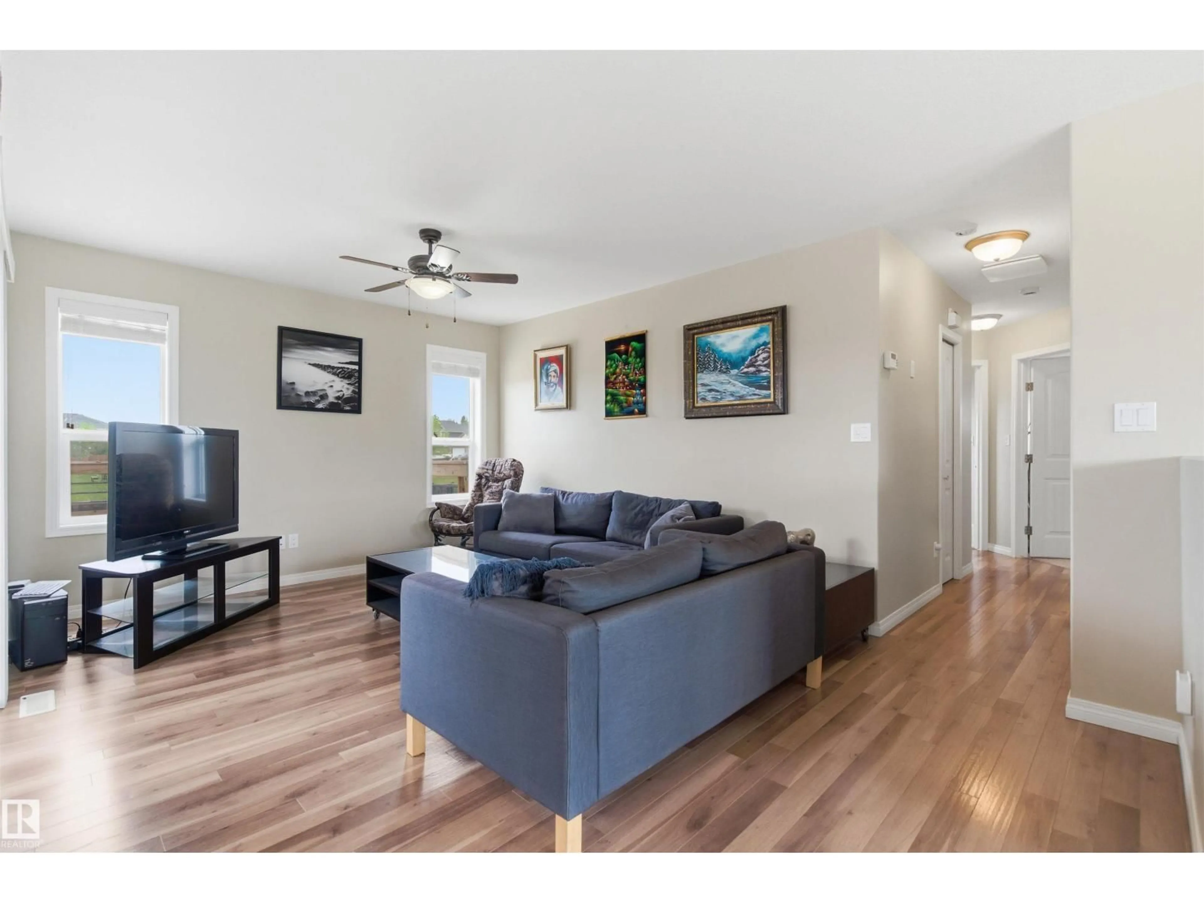 Living room with furniture, wood/laminate floor for 4604 62 AV, Cold Lake Alberta T9M2B5