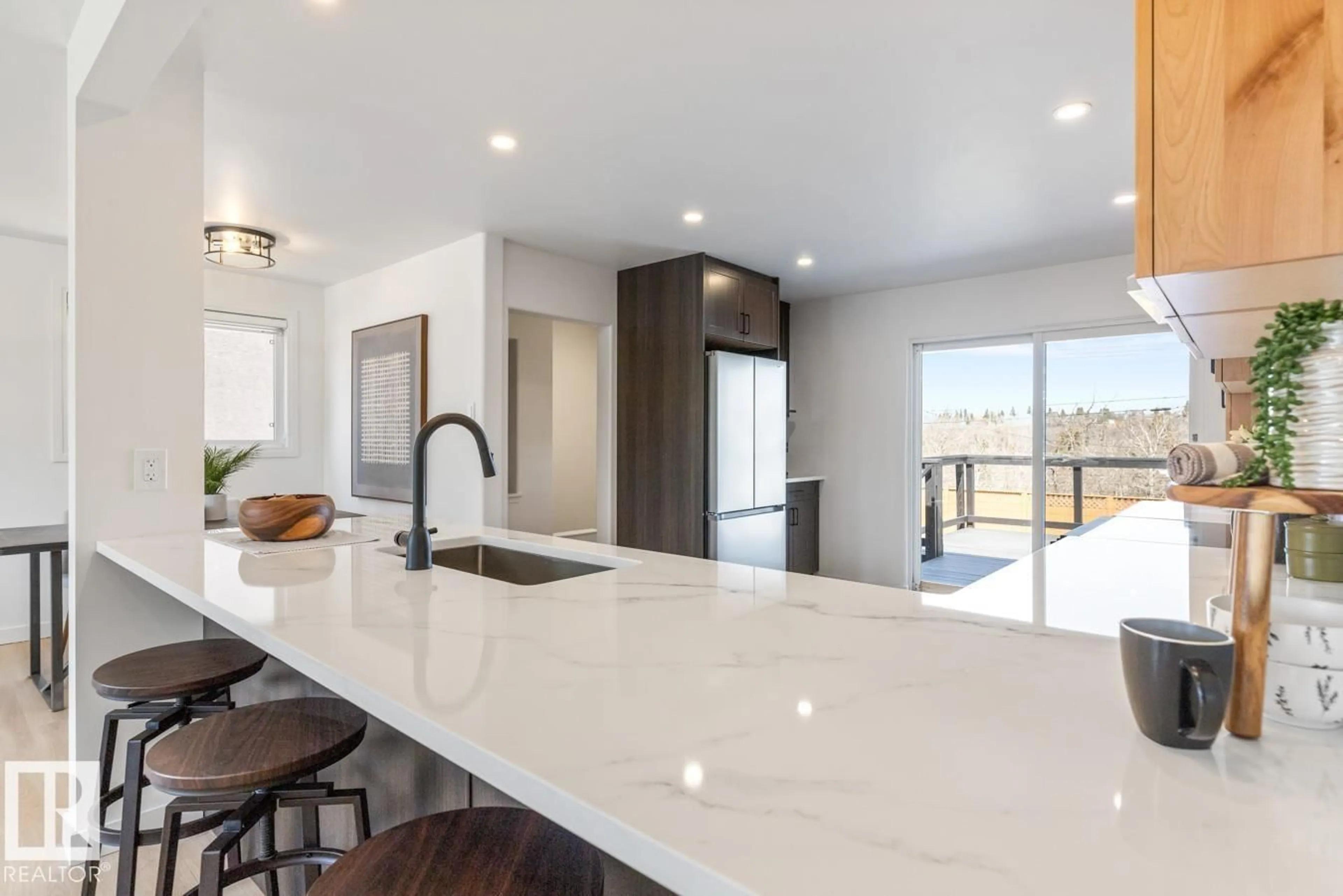 Open concept kitchen, ceramic/tile floor for 4508 109A AV, Edmonton Alberta T6A1S4