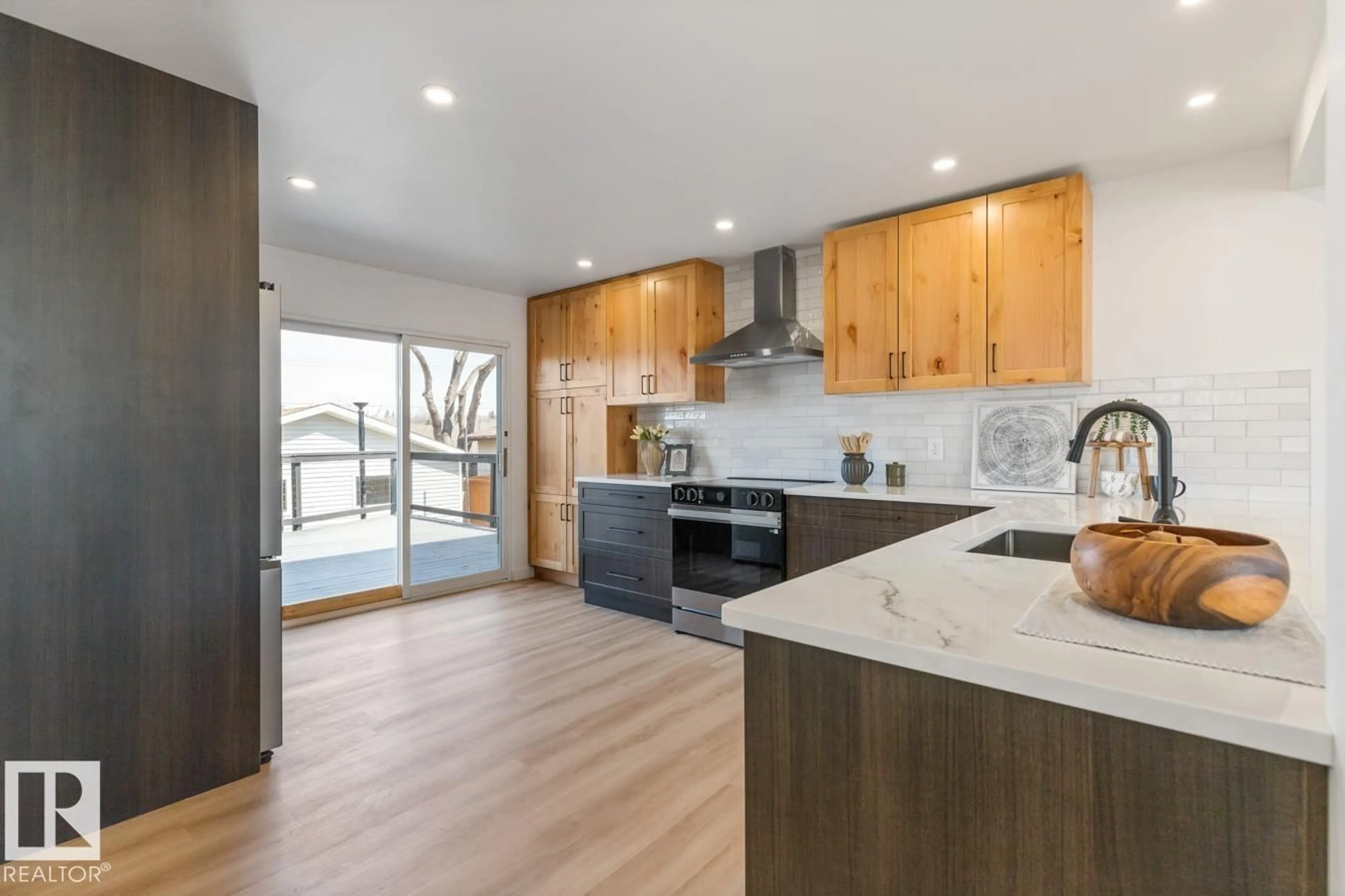 Open concept kitchen, unknown for 4508 109A AV, Edmonton Alberta T6A1S4