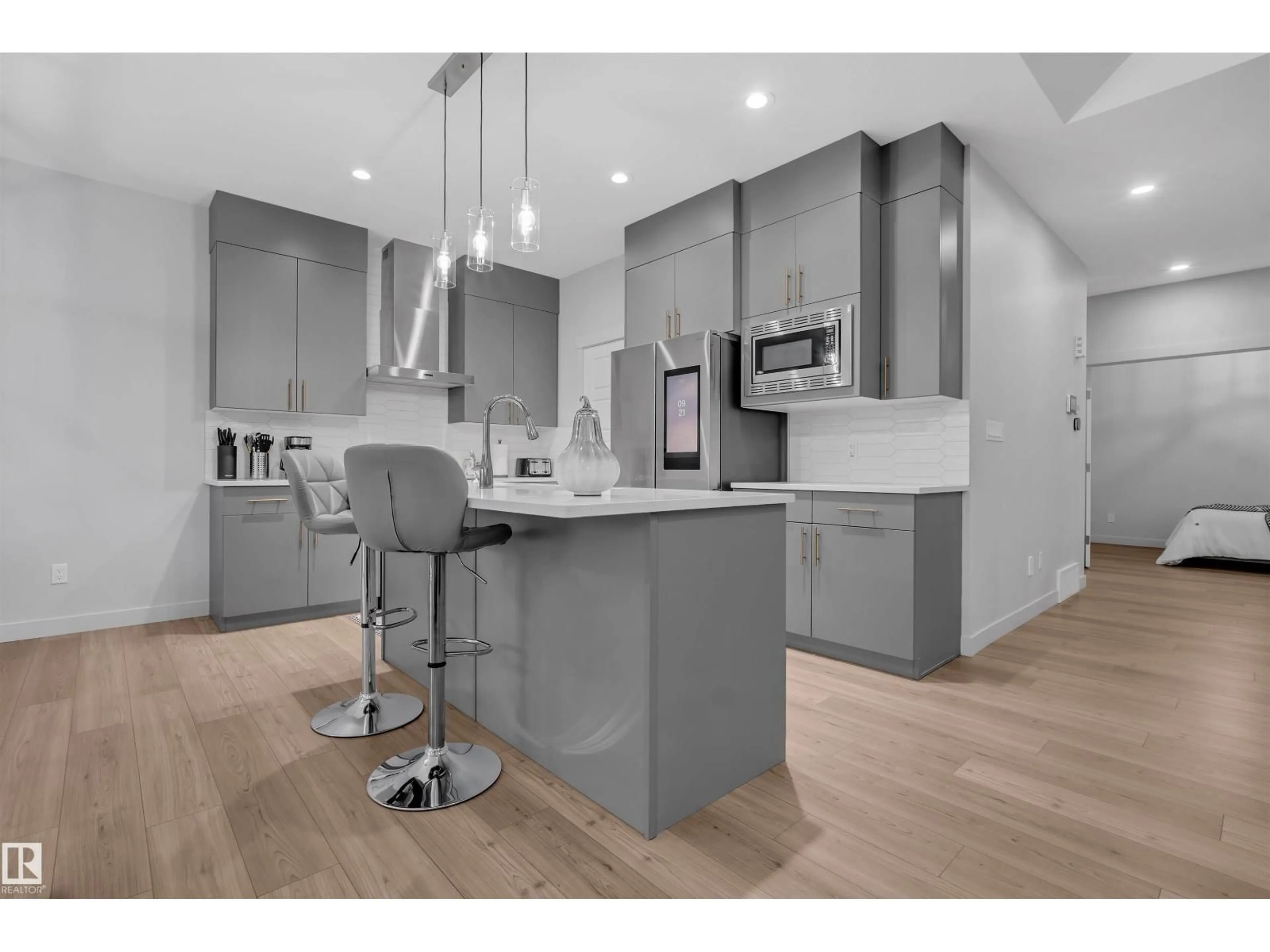 Open concept kitchen, wood/laminate floor for SW - 1616 157 ST, Edmonton Alberta T6W5E1