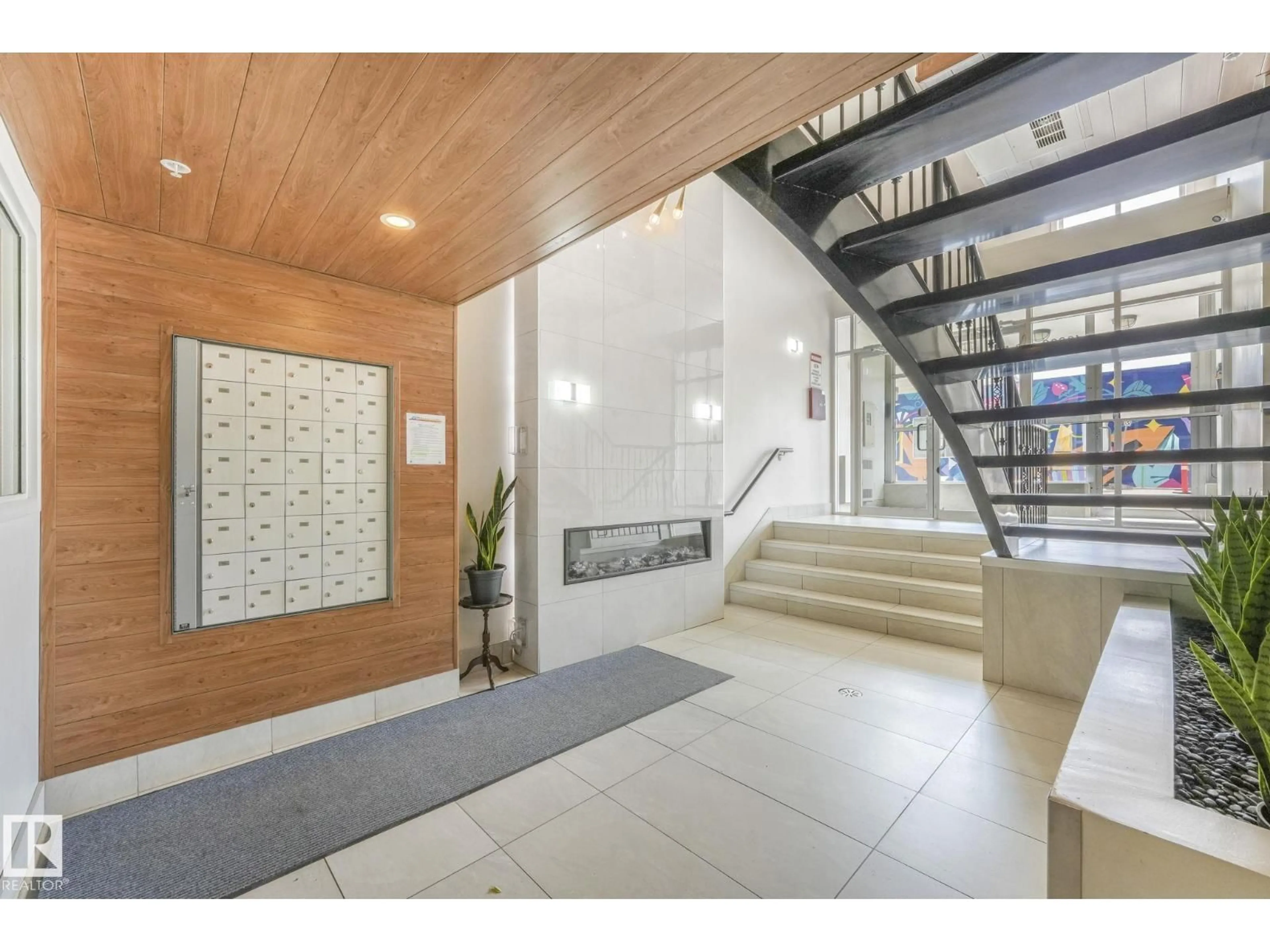 Indoor foyer for #310 - 10606 102 AV, Edmonton Alberta T5J5E9