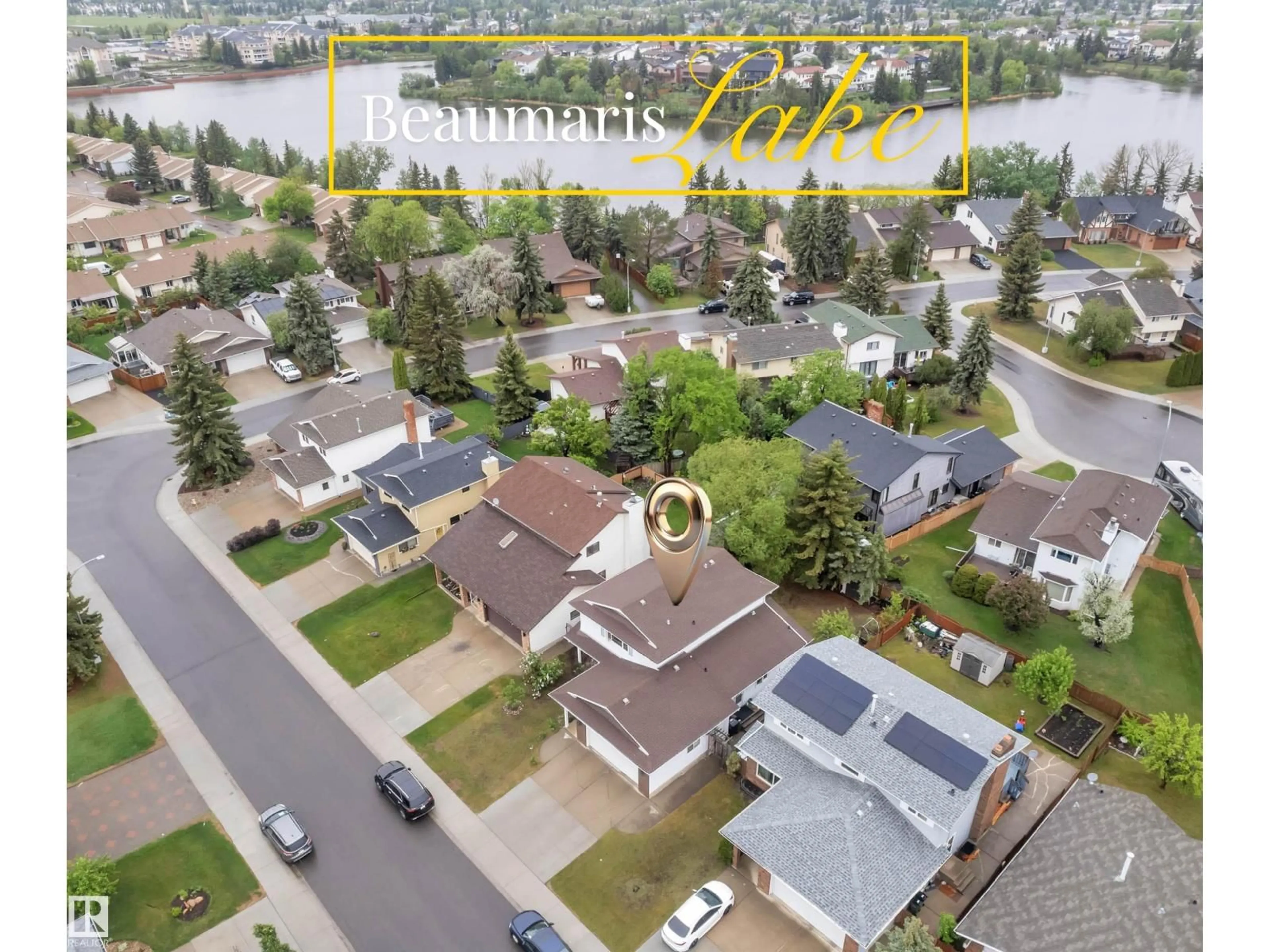 A pic from outside/outdoor area/front of a property/back of a property/a pic from drone, water/lake/river/ocean view for 10532 154 AV, Edmonton Alberta T5X5A9