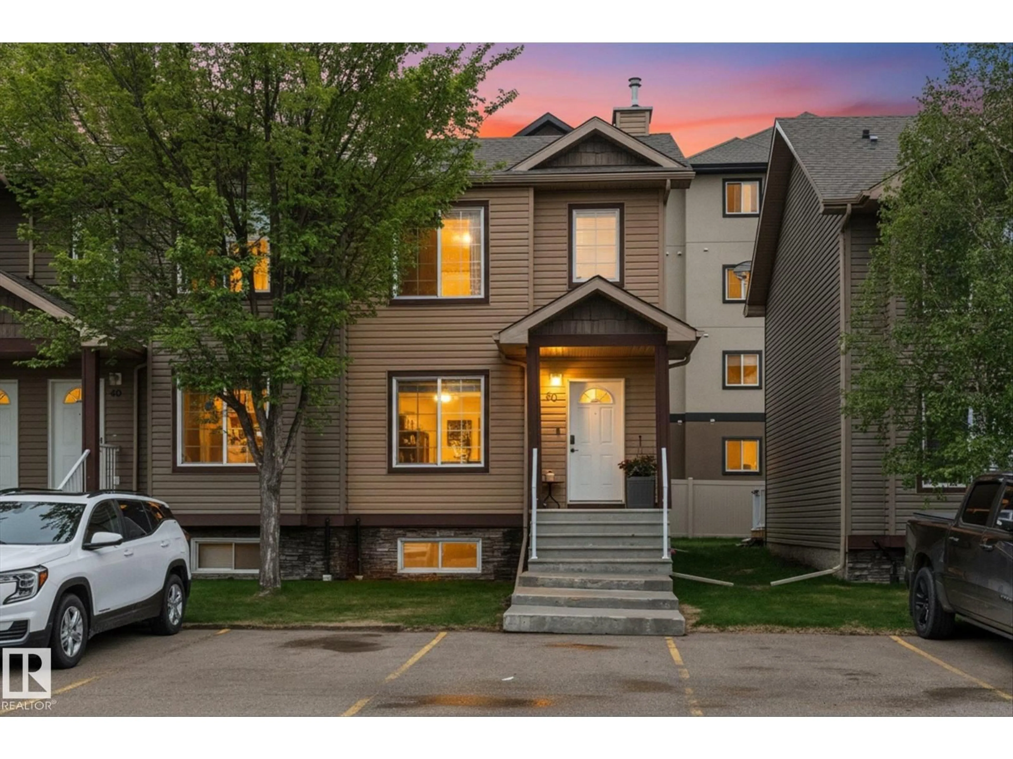 Home with vinyl exterior material, street for 50 320 SPRUCE RIDGE RD, Spruce Grove Alberta T7X2Z3